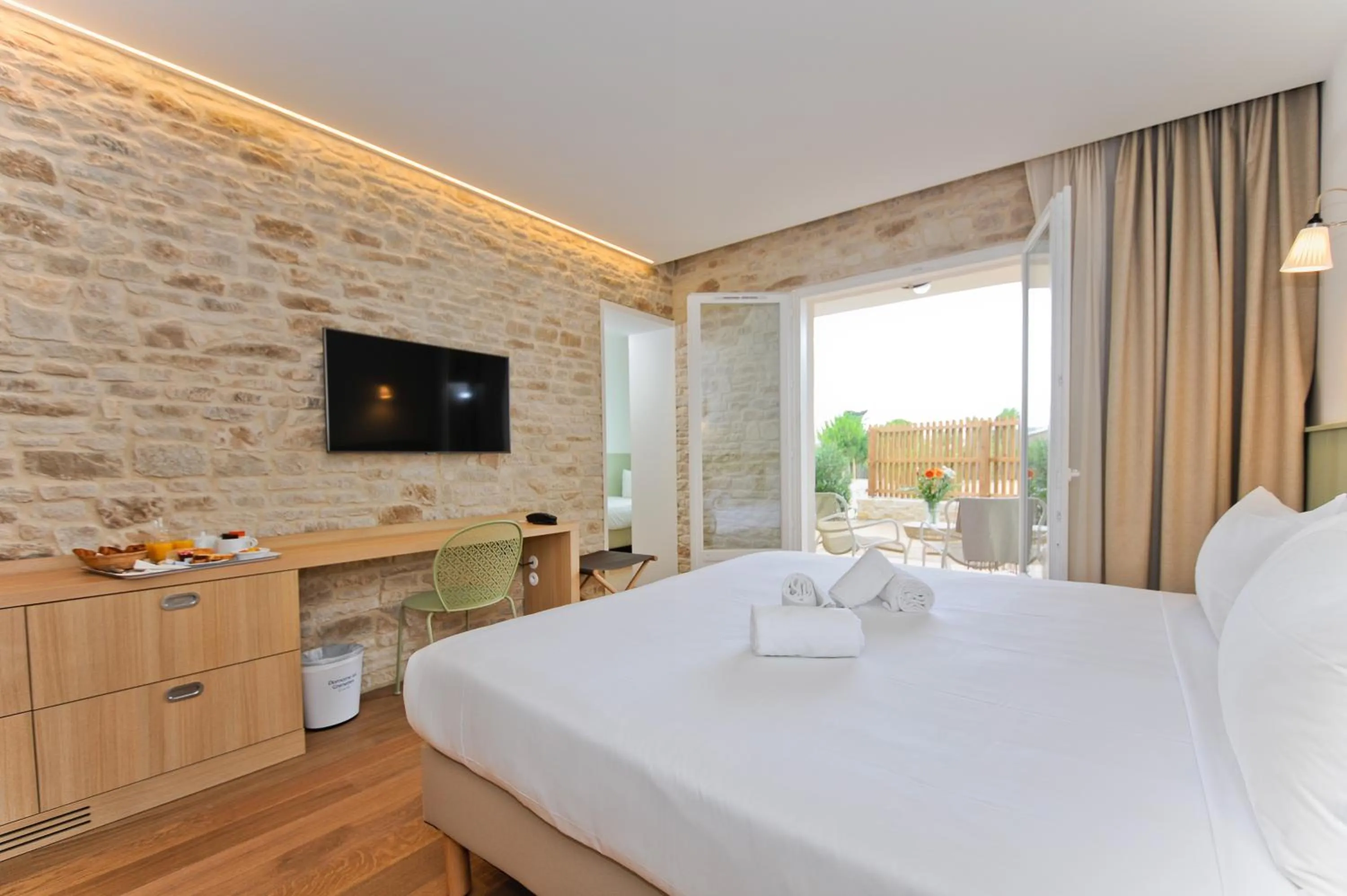 Photo of the whole room, Bed in Hôtel Les Grenettes