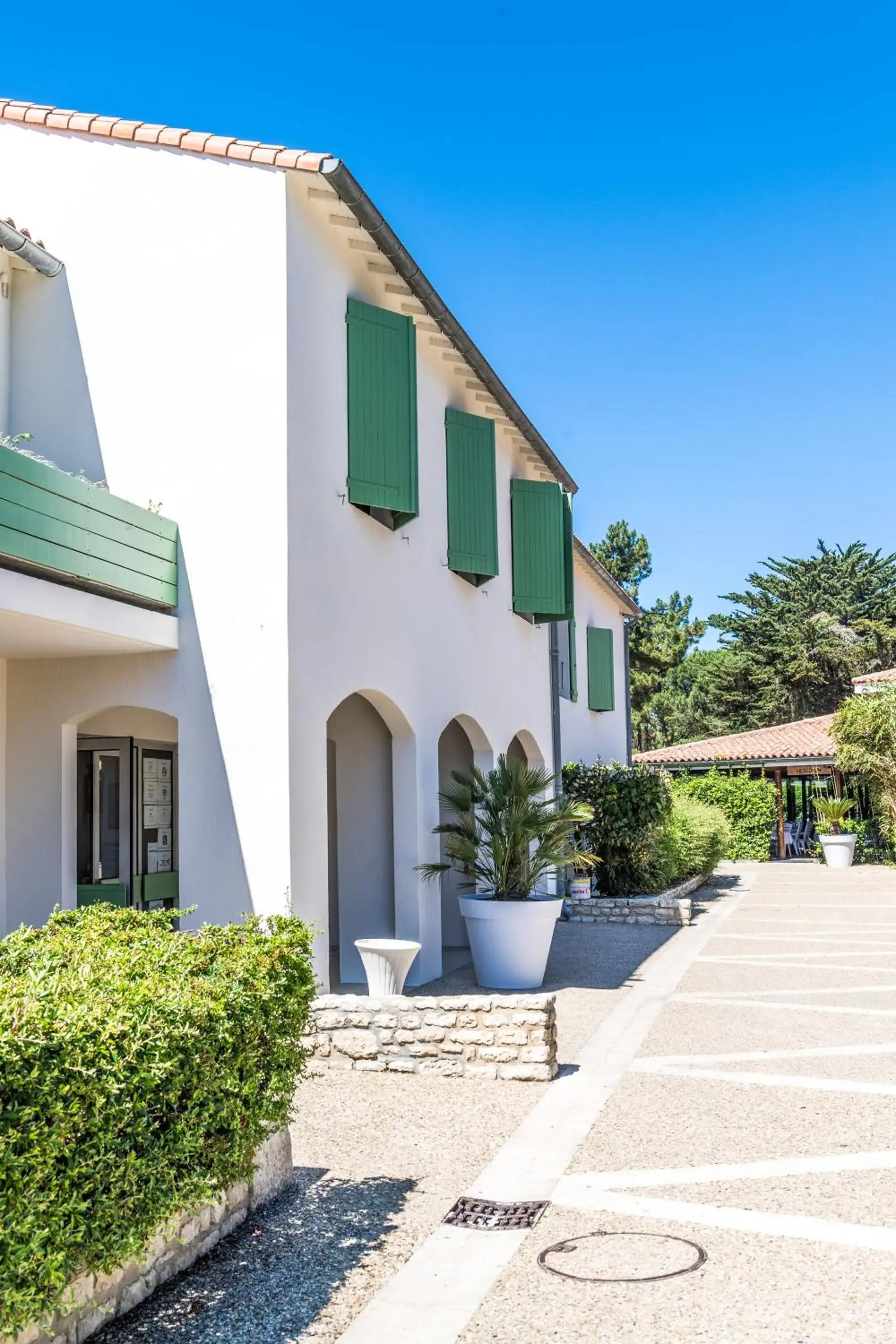 Property building in Hôtel Les Grenettes Property building in Hôtel Les Grenettes