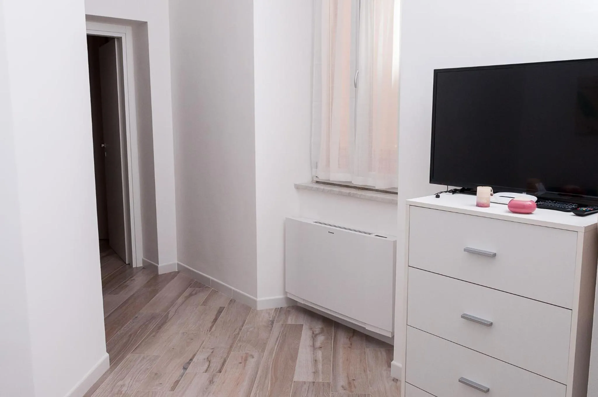 Communal lounge/ TV room in Quiet Home Terracina Apartments