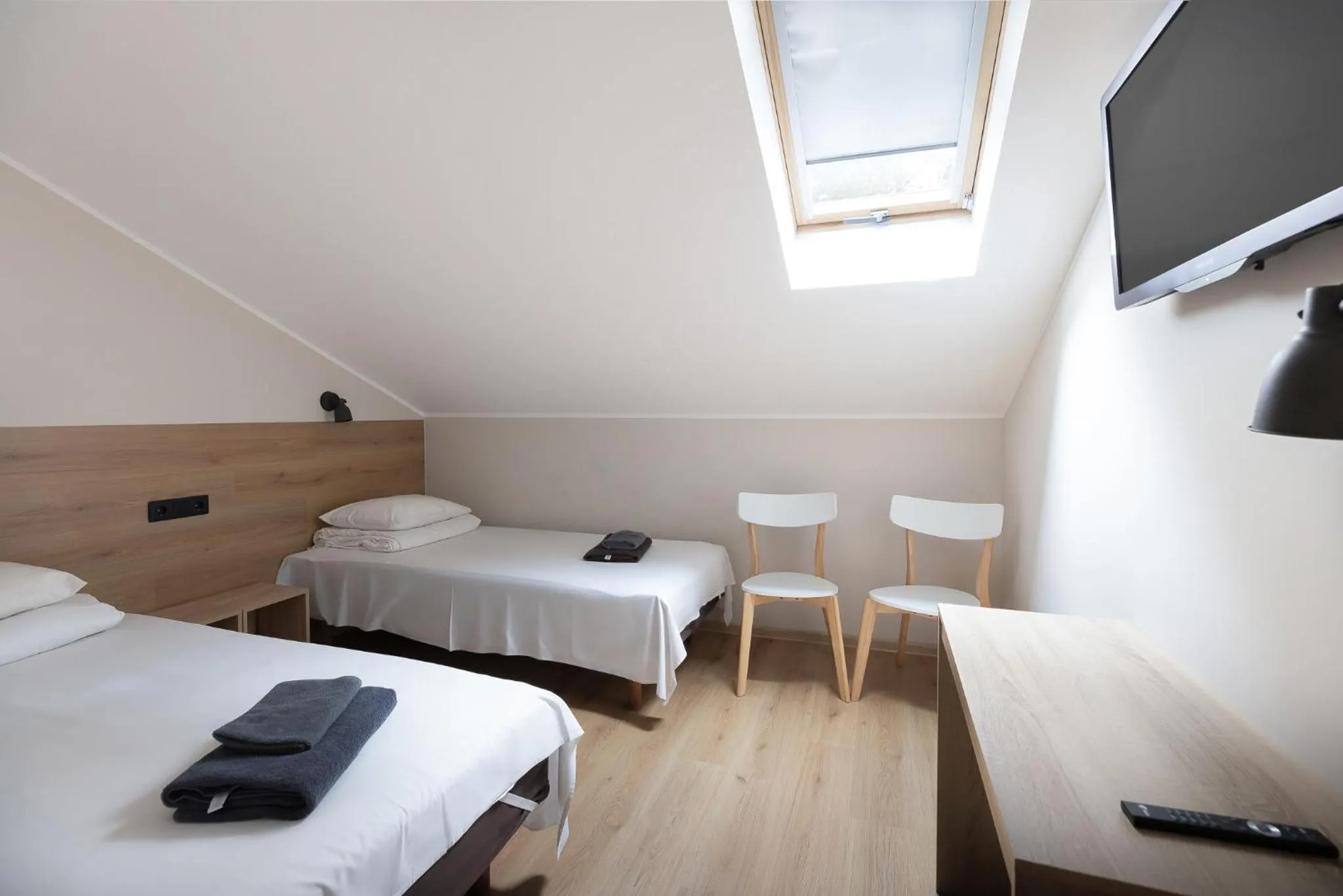 Photo of the whole room, Bed in Peoleo Hotell