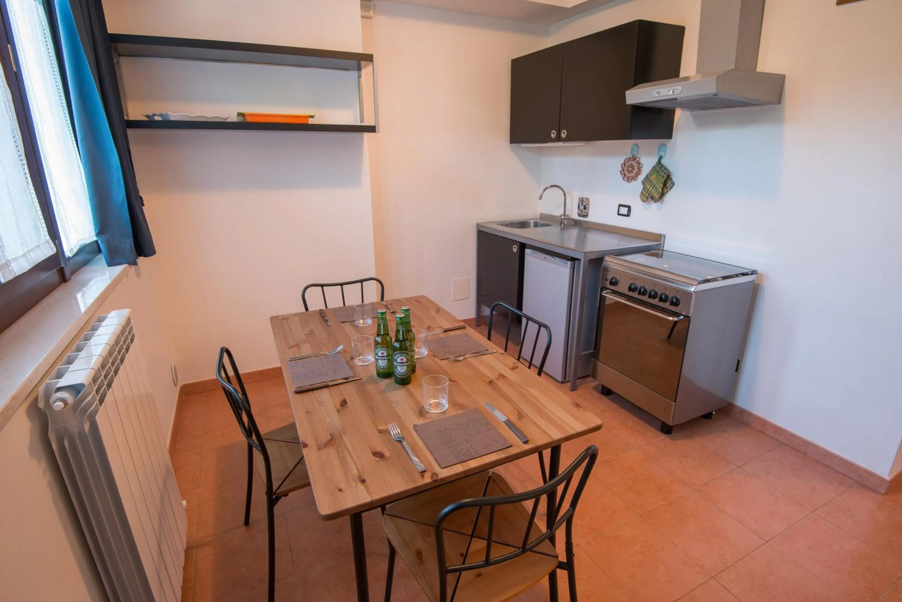 Kitchen or kitchenette in Albergo Della Corte