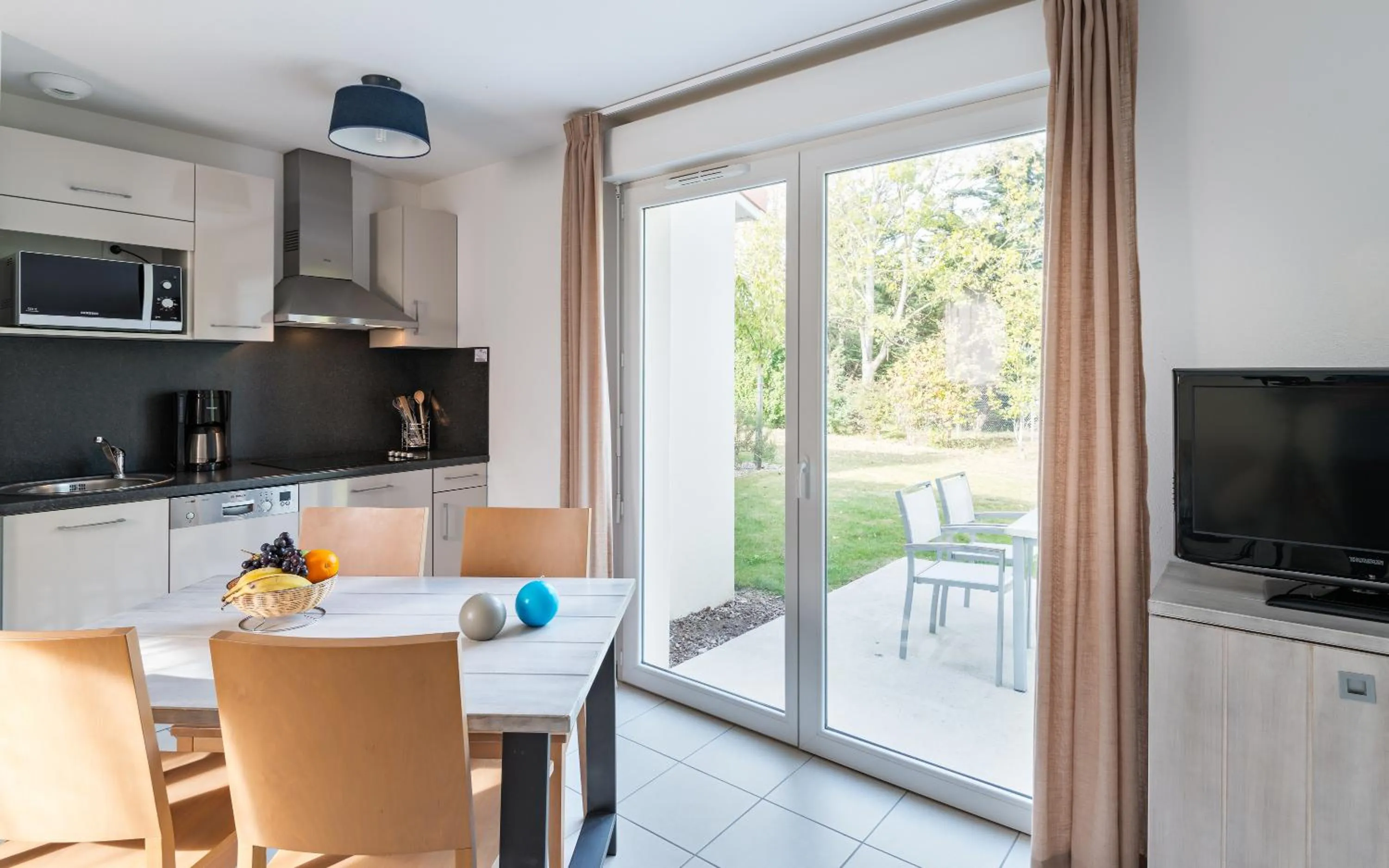 Kitchen or kitchenette in Lagrange Vacances Le Village de la Mer