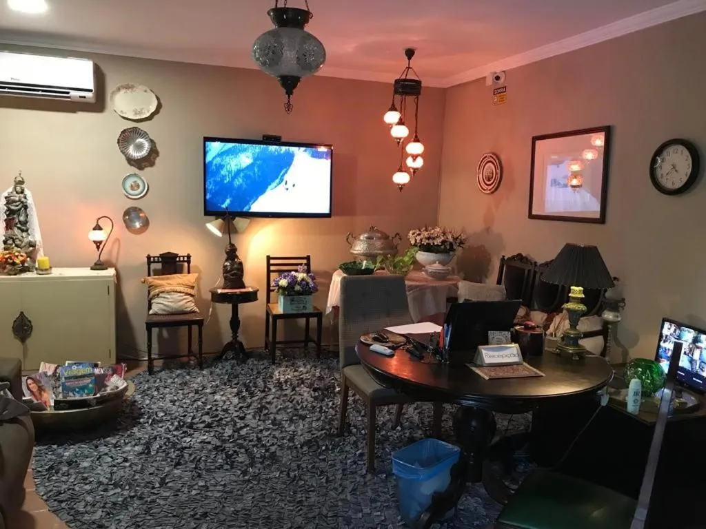 Lobby or reception in Suítes Bouganville