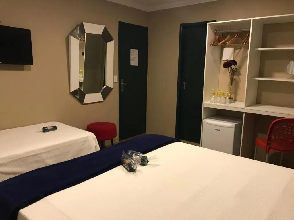 TV and multimedia, Bed in Suítes Bouganville