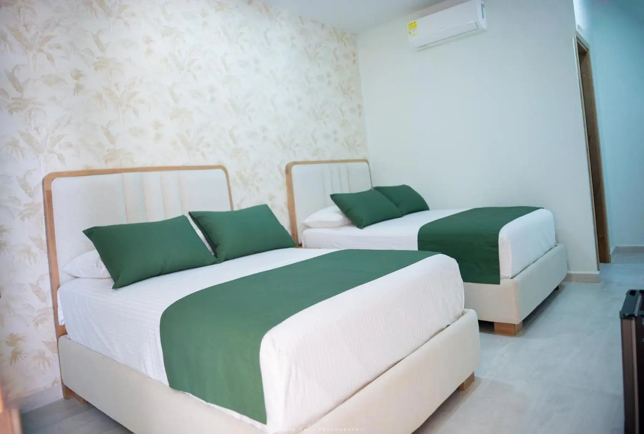 Deluxe Double Room with Two Double Beds in Cabanas Villa Antonella Covenas Deluxe Double Room with Two Double Beds in Cabanas Villa Antonella Covenas