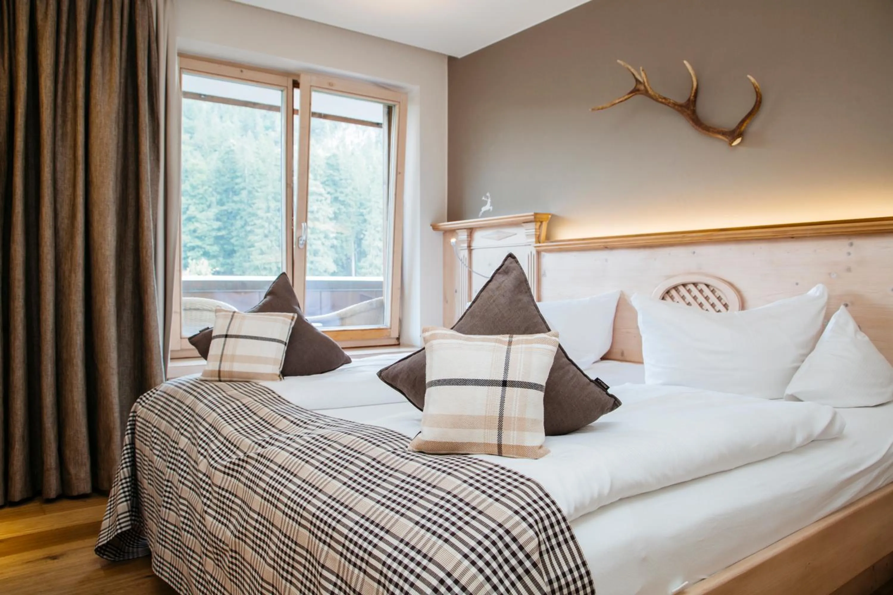Bed in Berghotel Schlossanger Alp