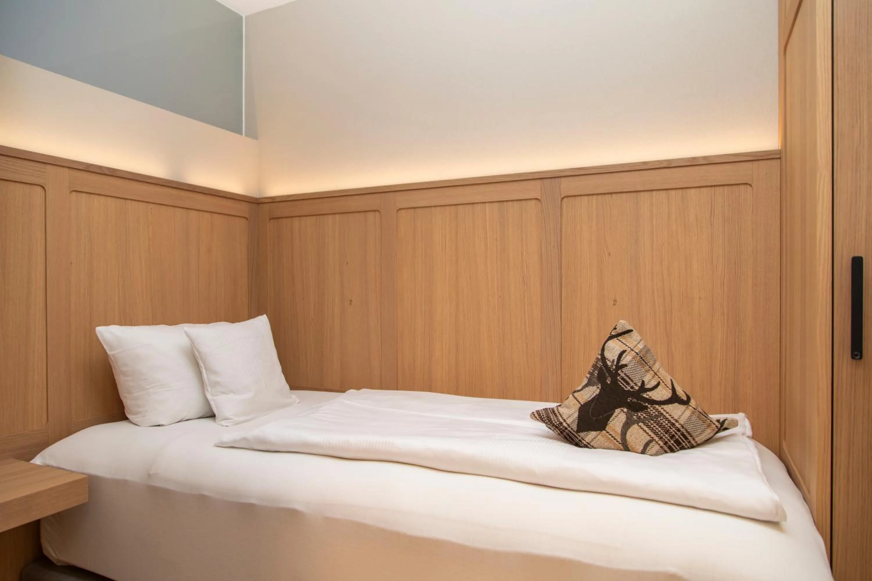 Bed in Berghotel Schlossanger Alp