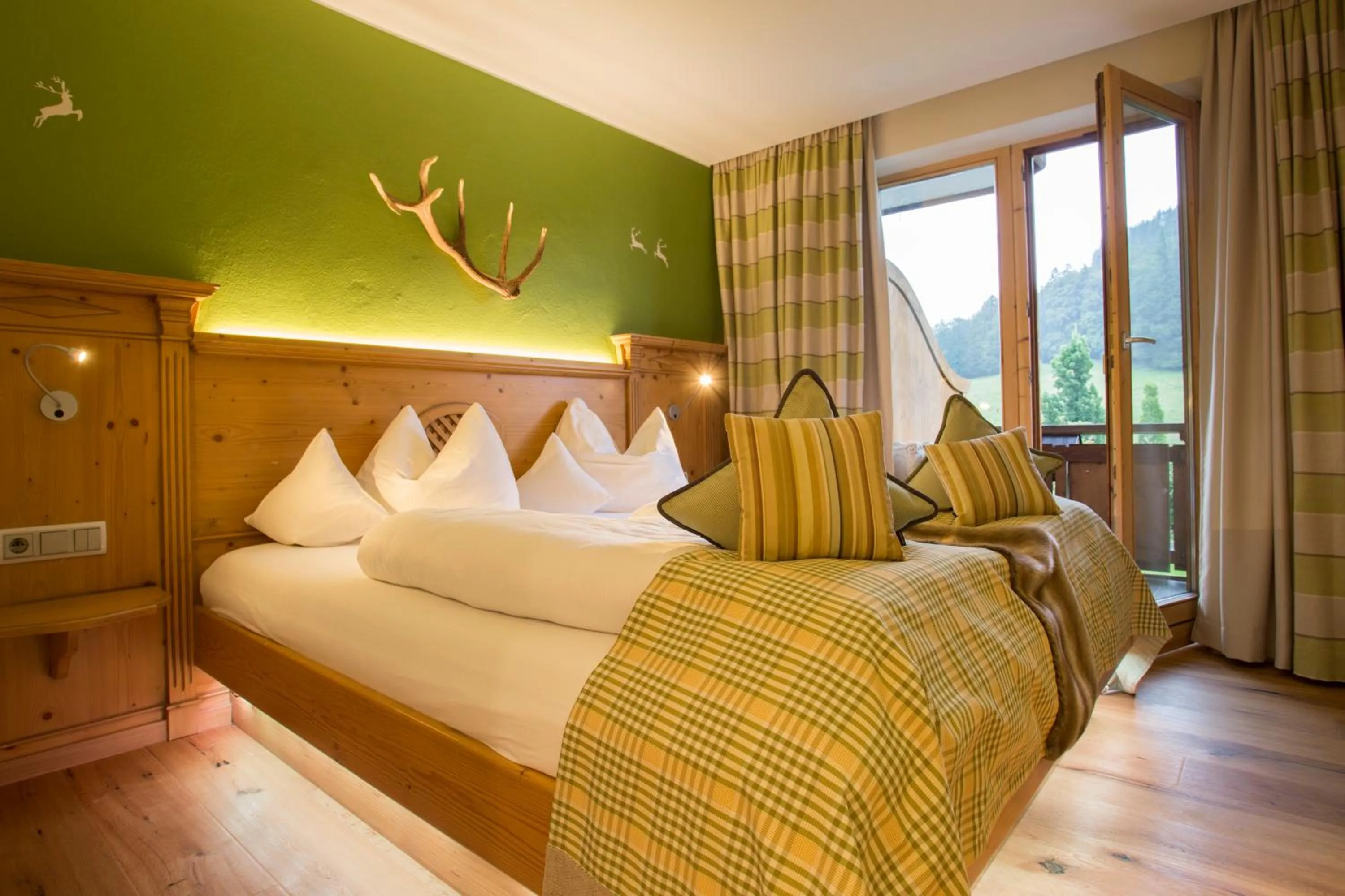 Bedroom, Bed in Berghotel Schlossanger Alp