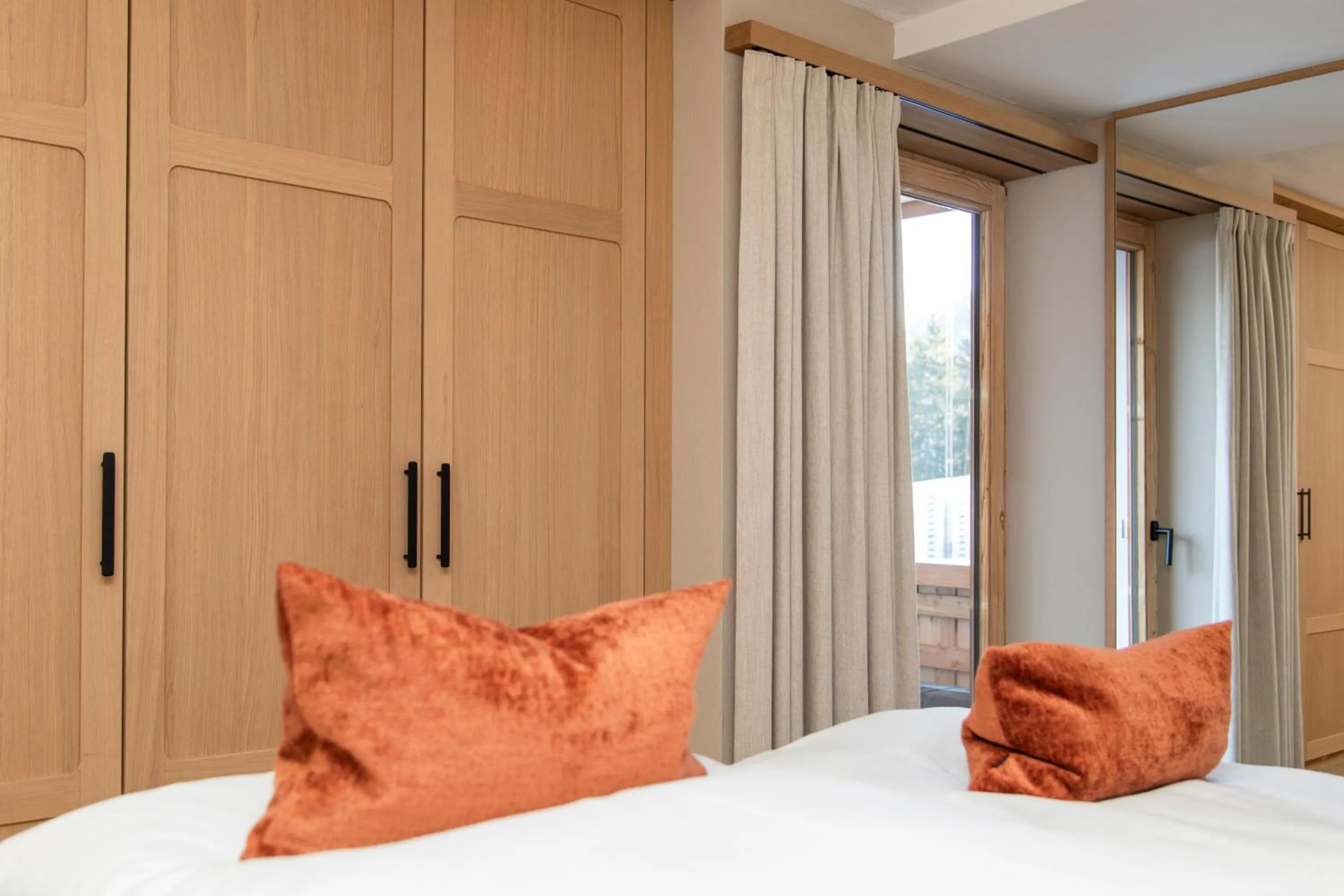 wardrobe, Bed in Berghotel Schlossanger Alp
