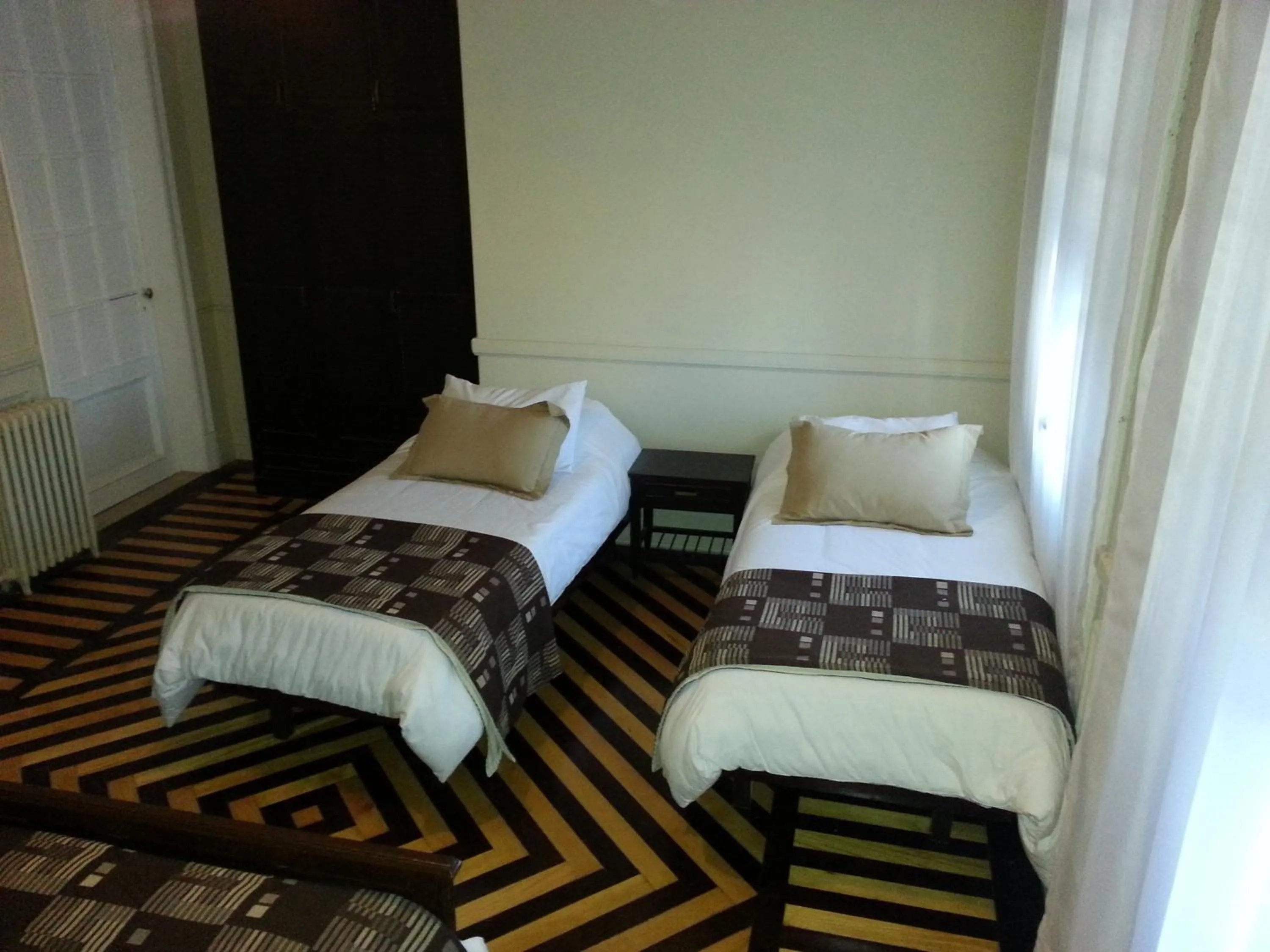 Bed in New Arapey Hotel