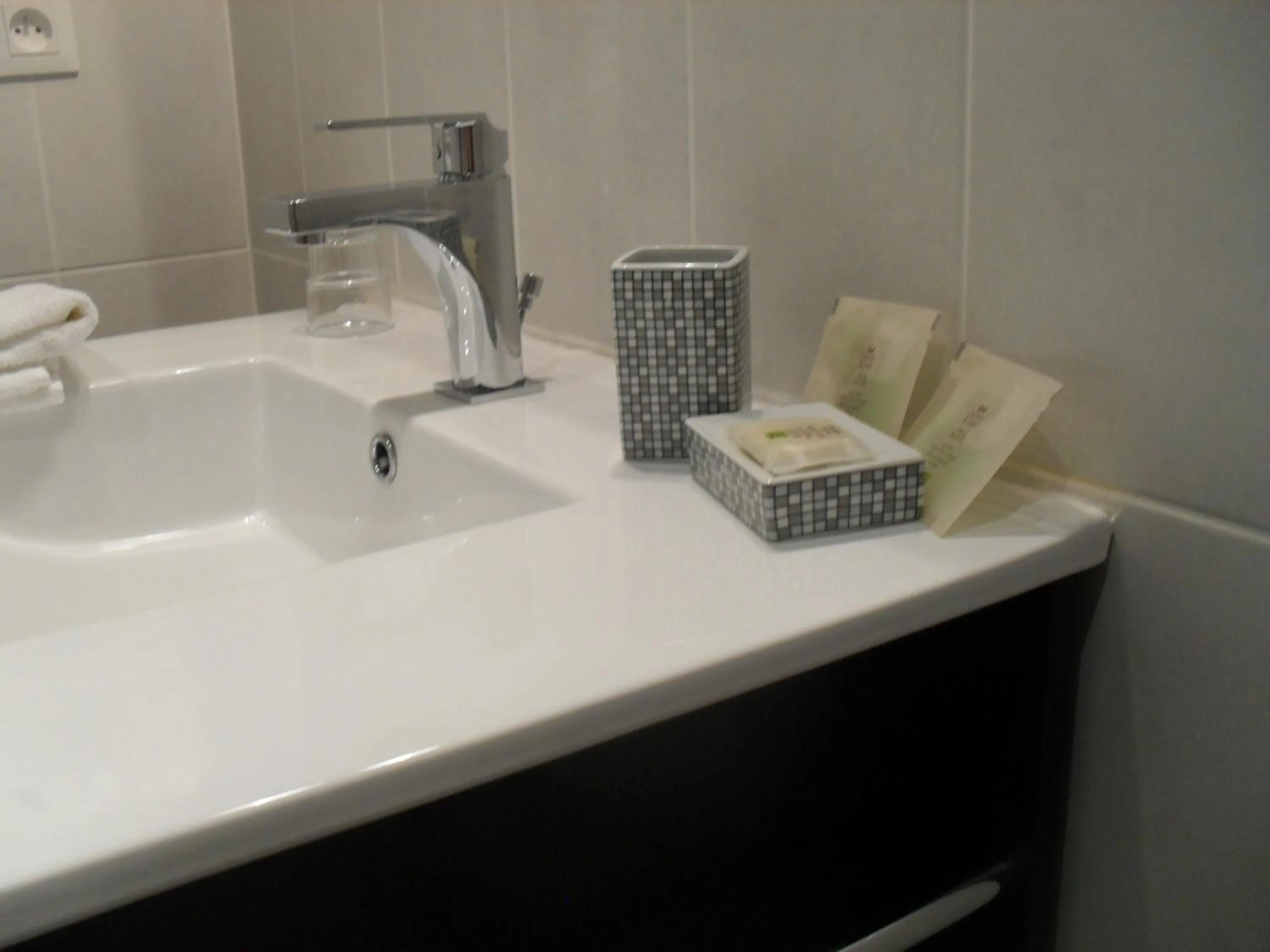 Bathroom in Logis Hôtel Andreinia & Cabanes