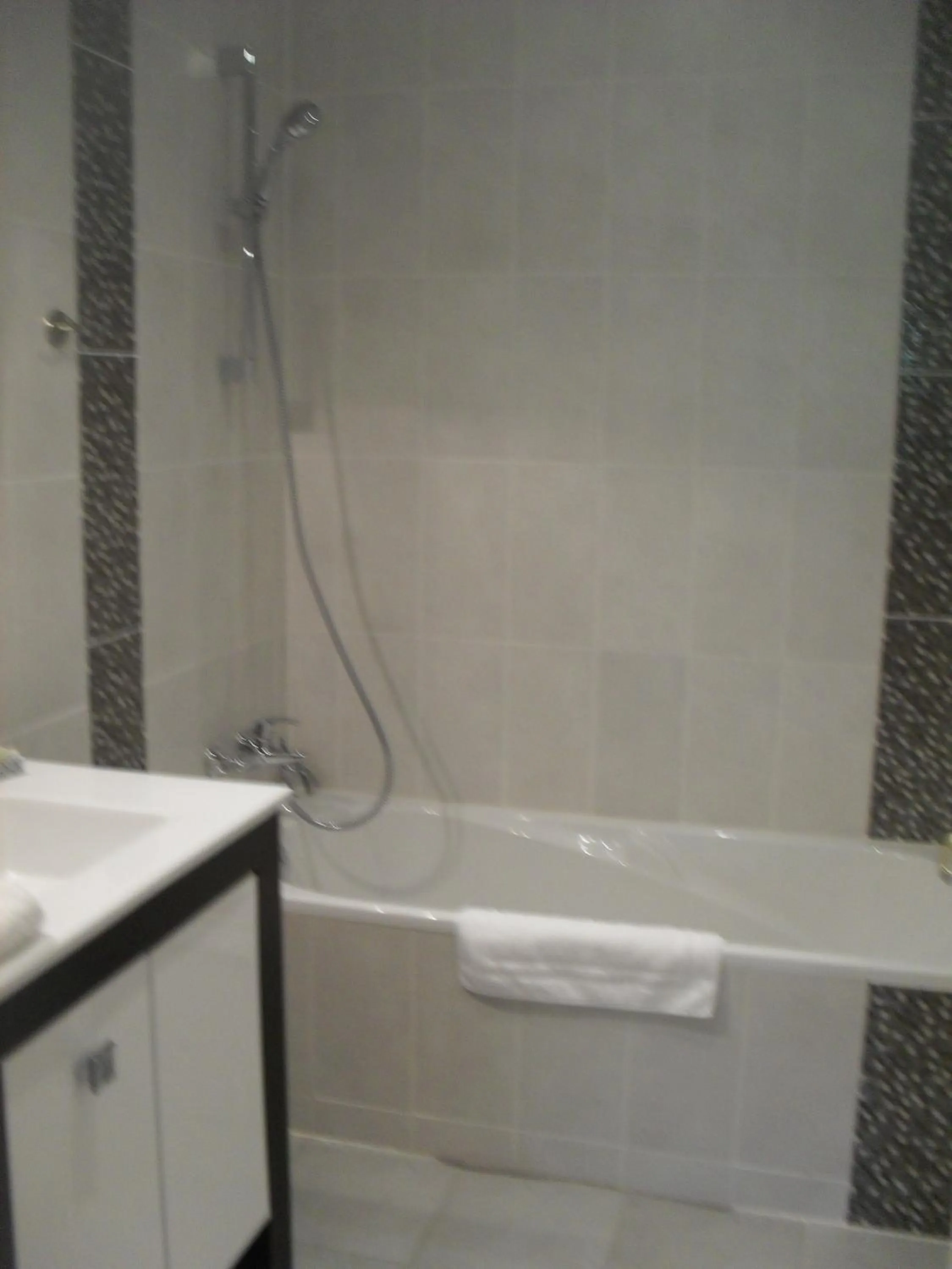 Bathroom in Logis Hôtel Andreinia & Cabanes