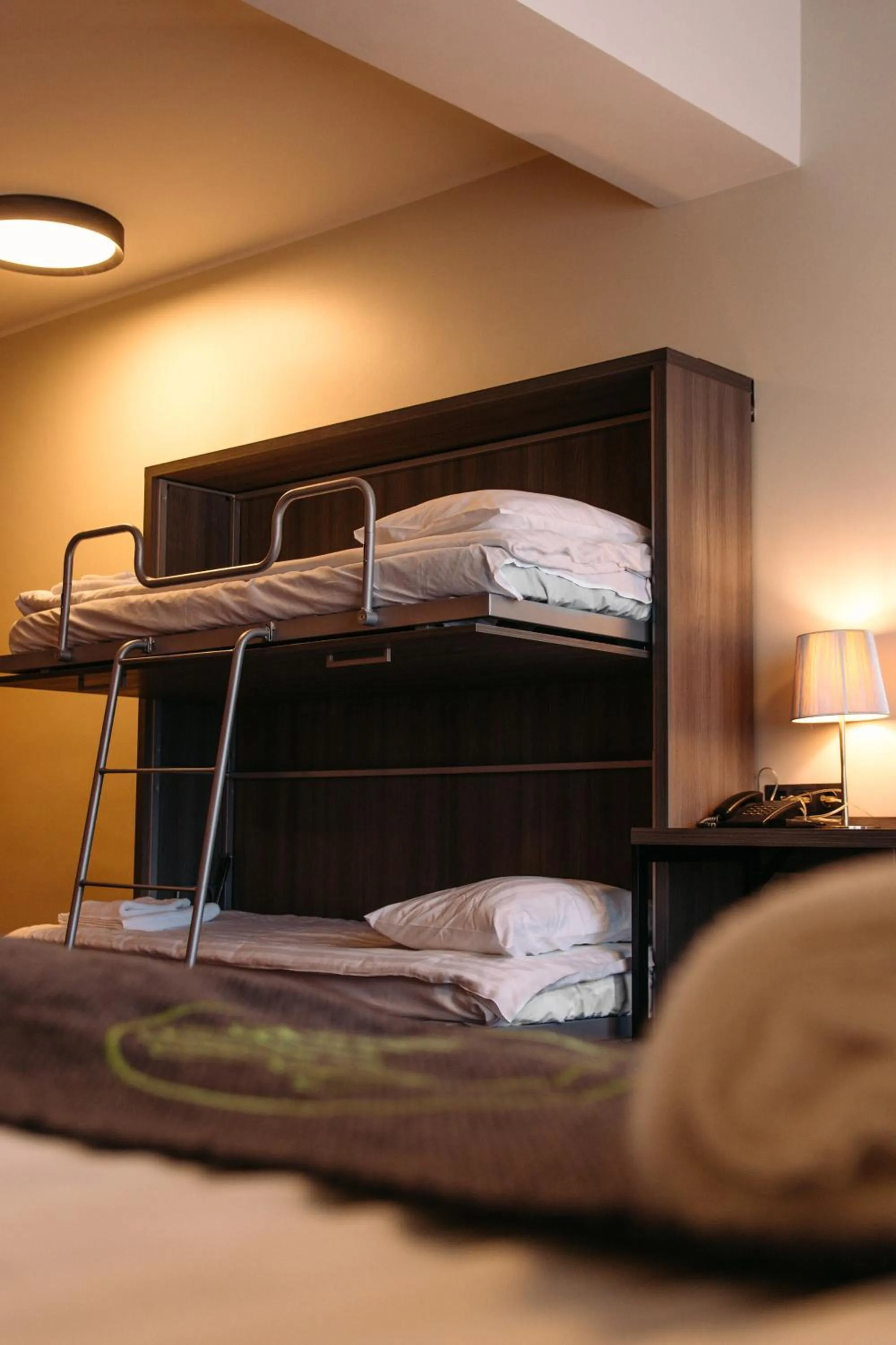 Bed in Braavo Spa Hotel