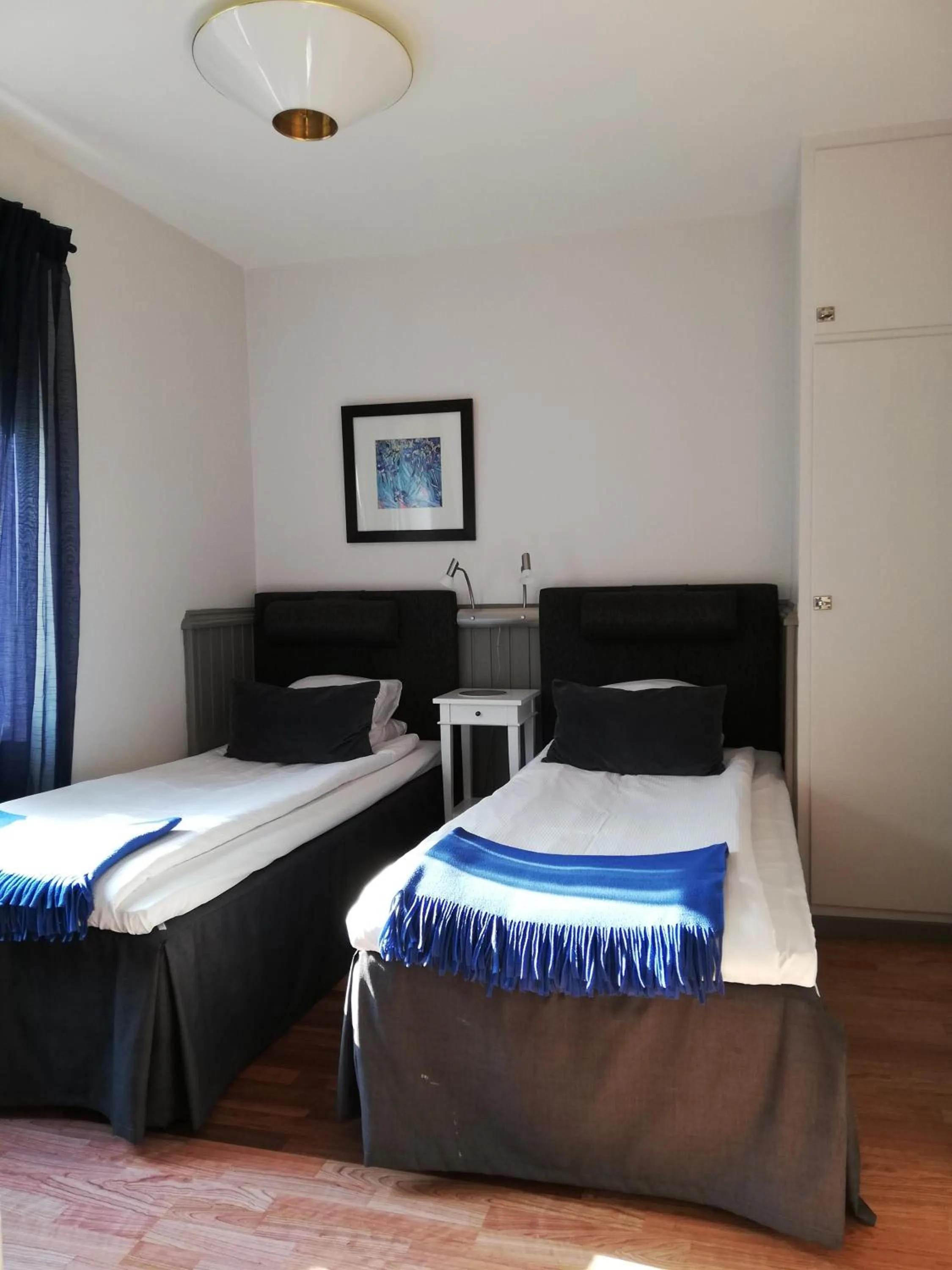 Bed in Strand Hotell