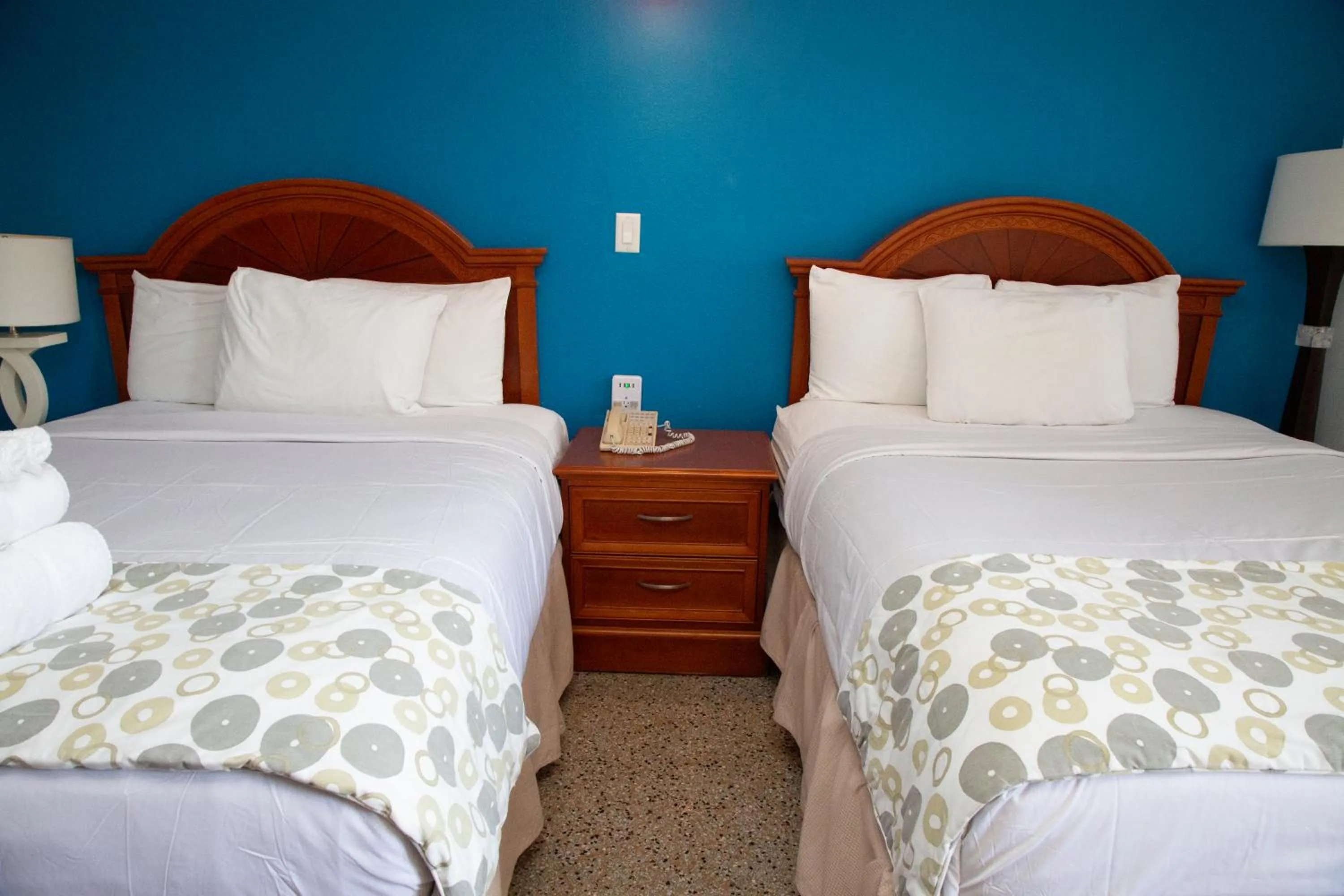 Bed in Daytona Dream Inn By AmeriVu