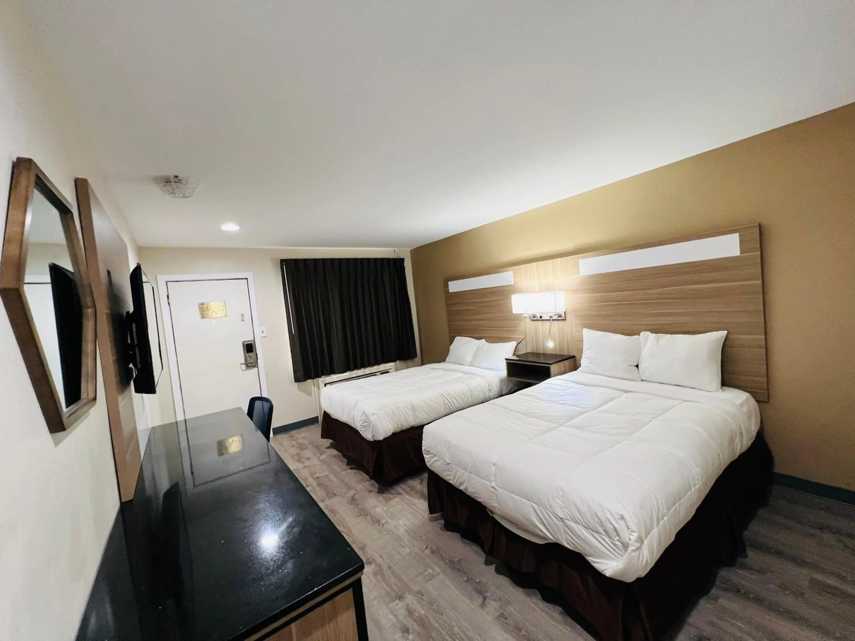 Bed in Rodeway Inn Oceanview