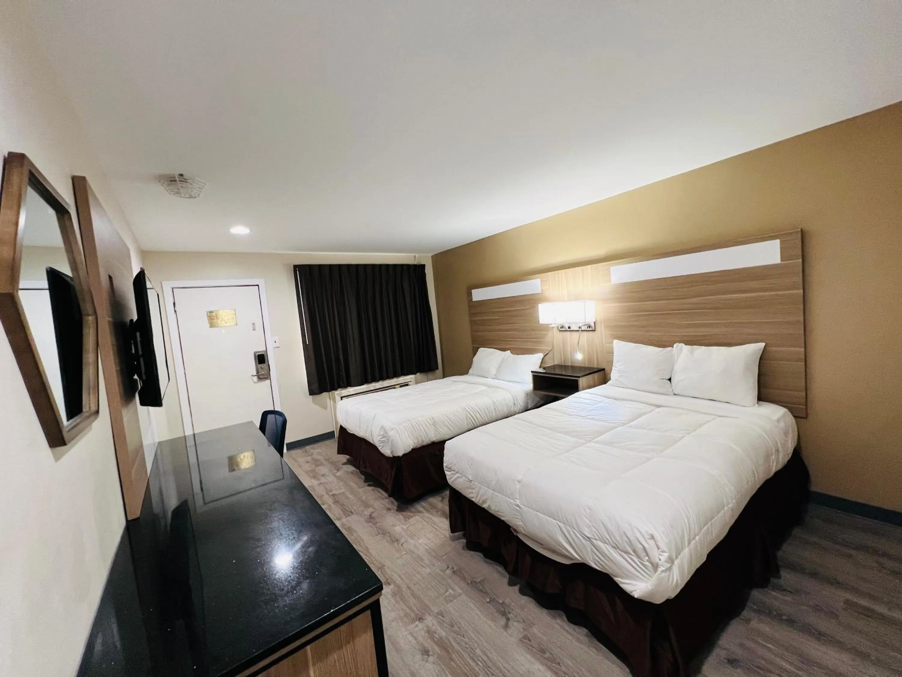 Bed in Rodeway Inn Oceanview