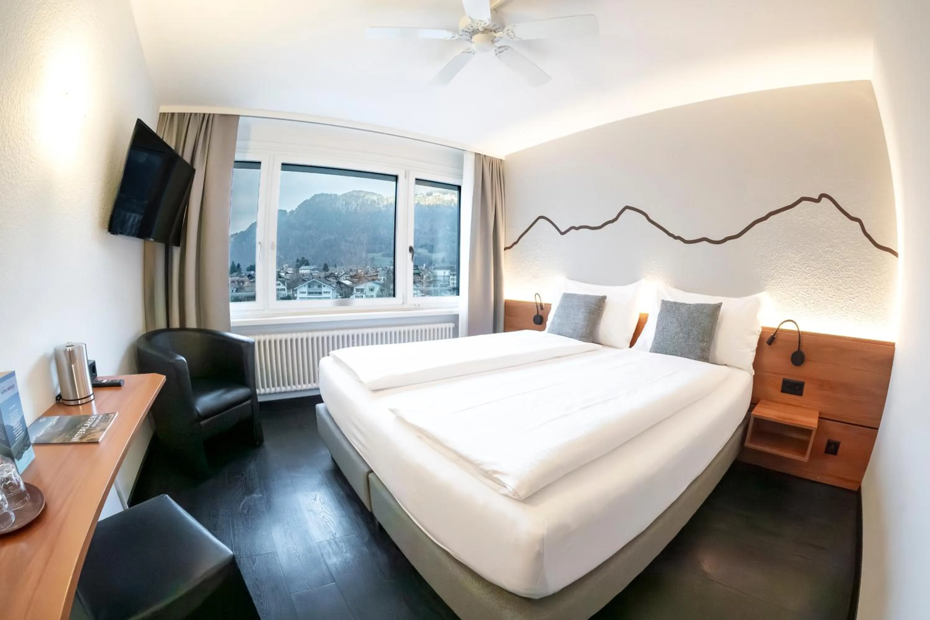 Bed in Hotel Merkur - West Station