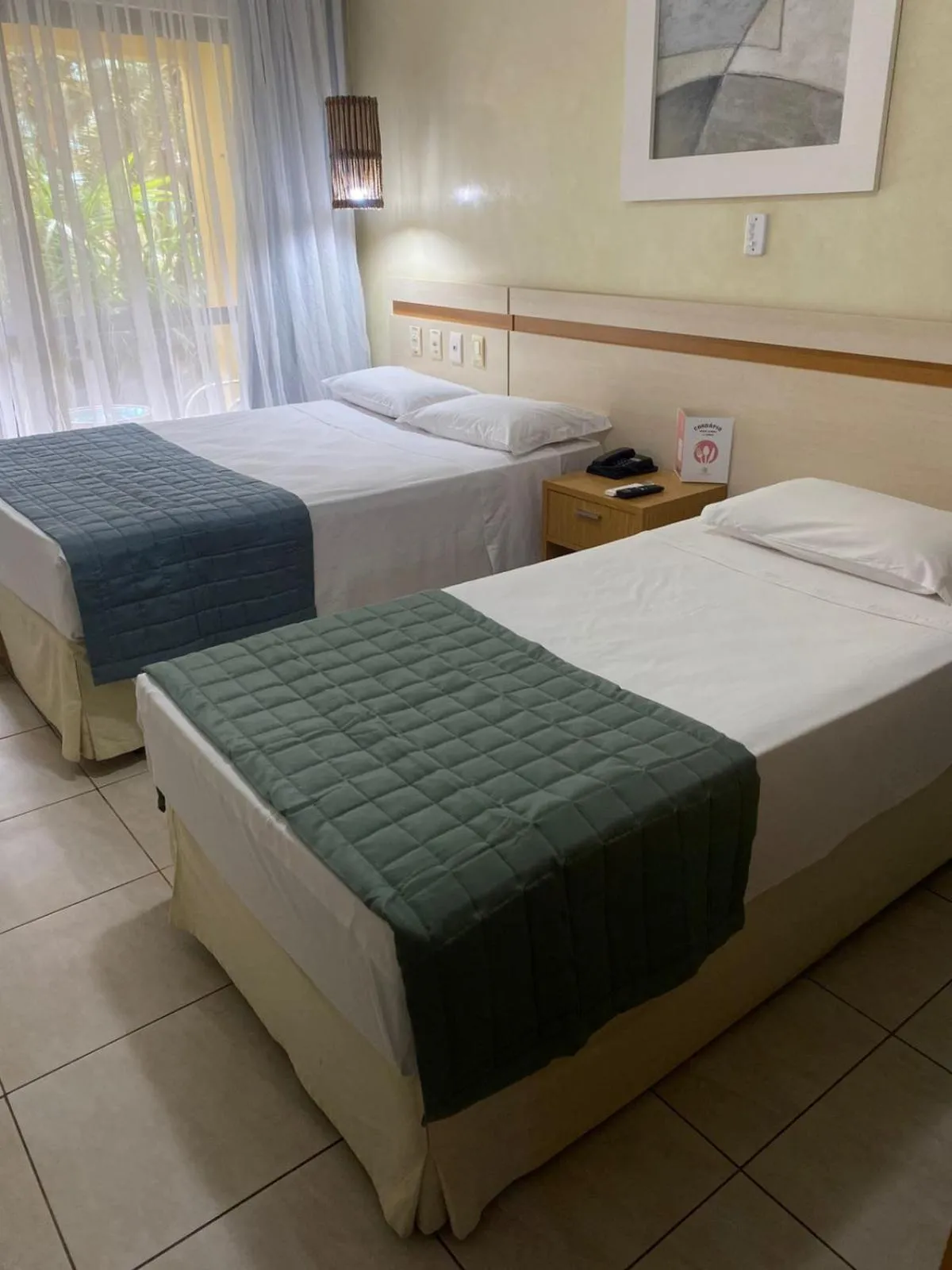 Bed in Catussaba Business Hotel