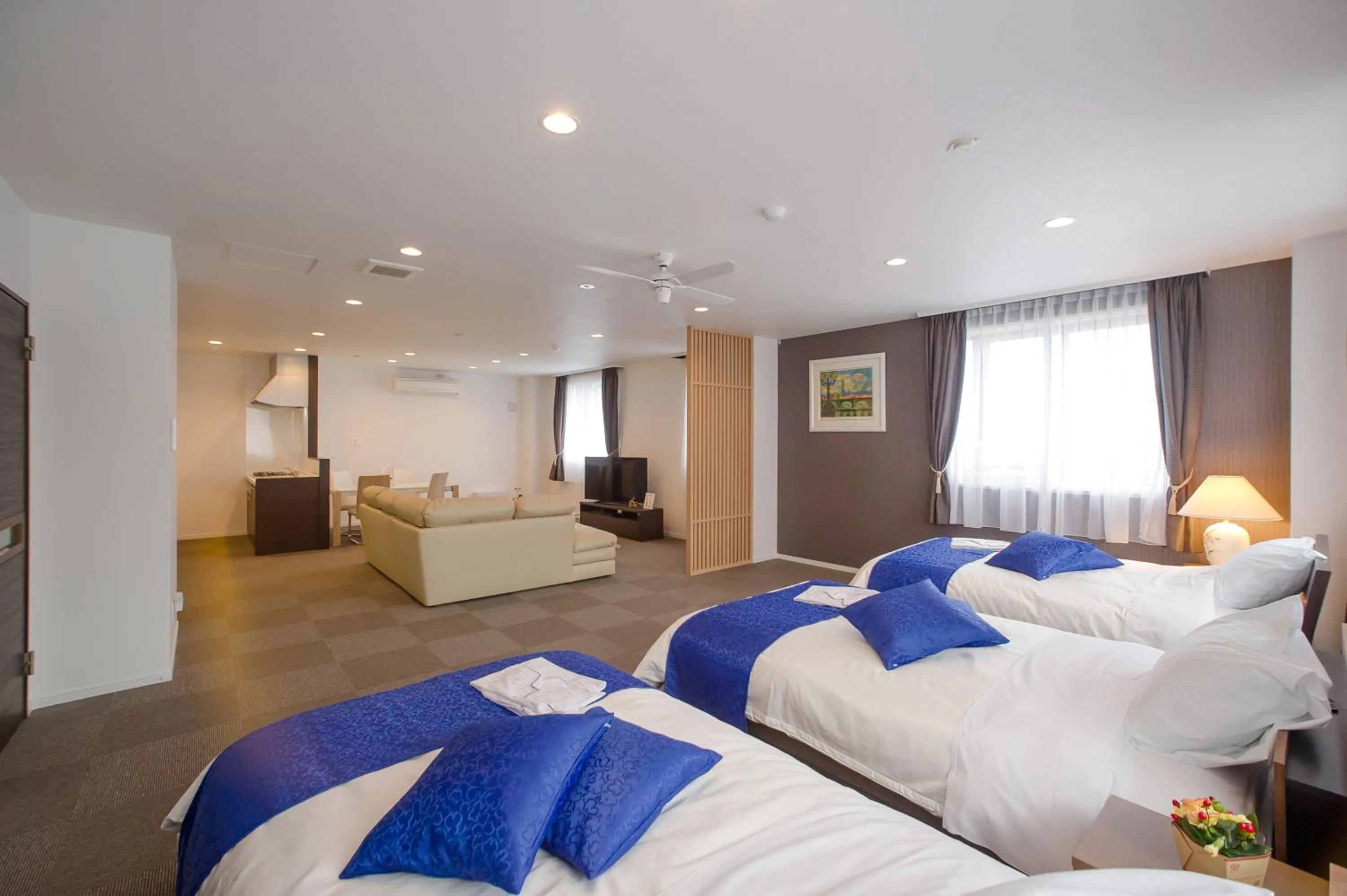 Photo of the whole room, Bed in Condominium Panoramique Motomachi