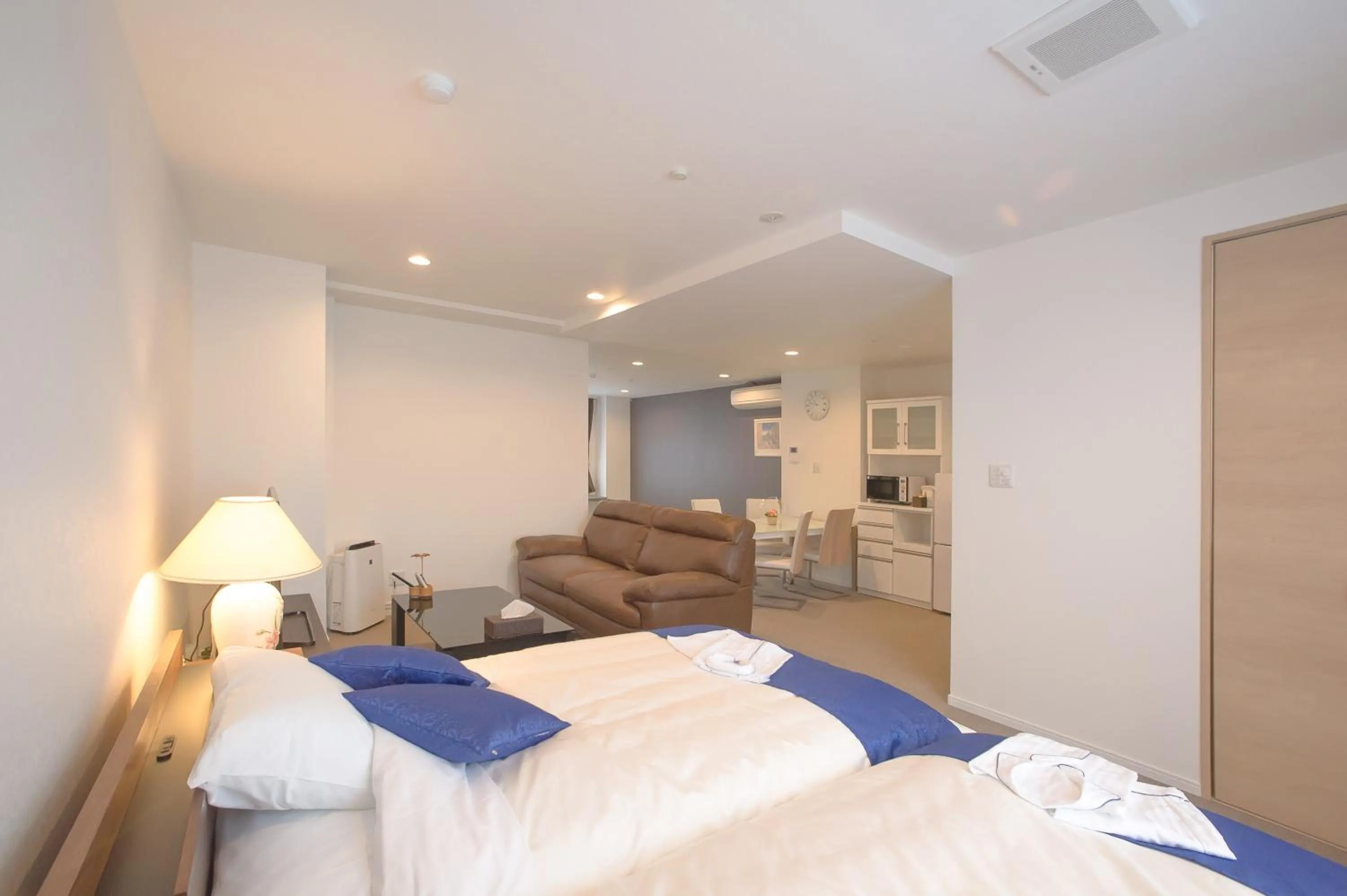 Photo of the whole room, Bed in Condominium Panoramique Motomachi