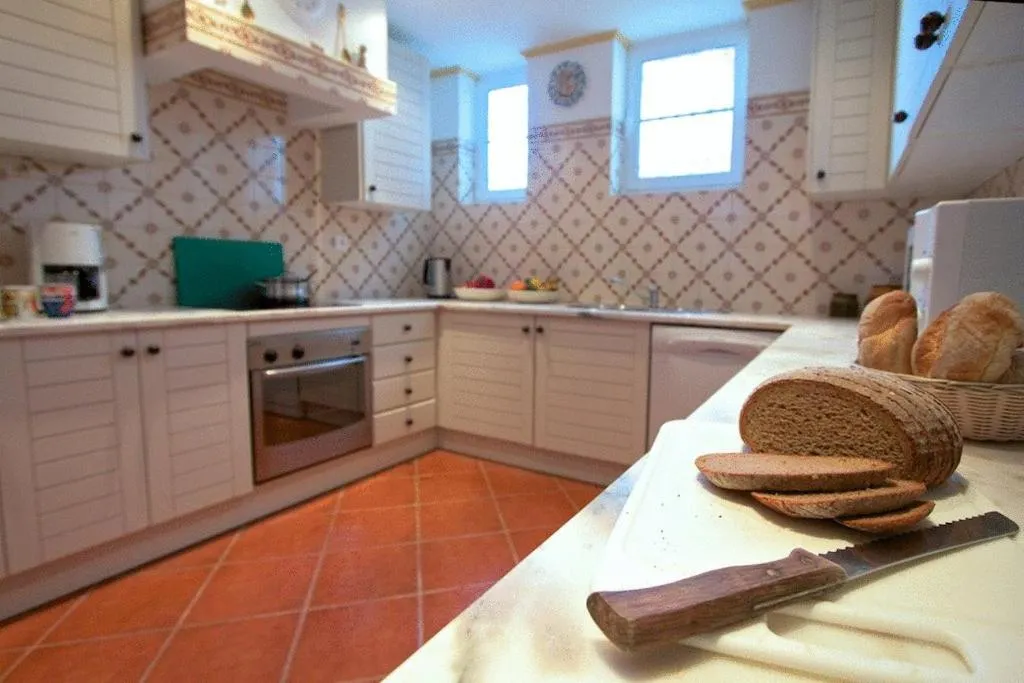 Kitchen or kitchenette in Apartamentos Os Descobrimentos