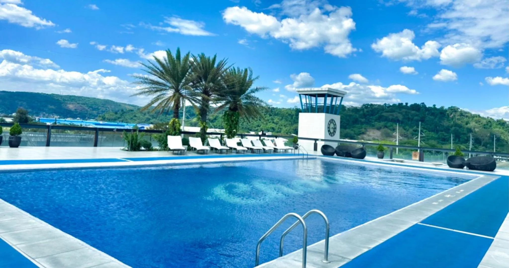 Swimming pool in Le Charmé Suites - Subic