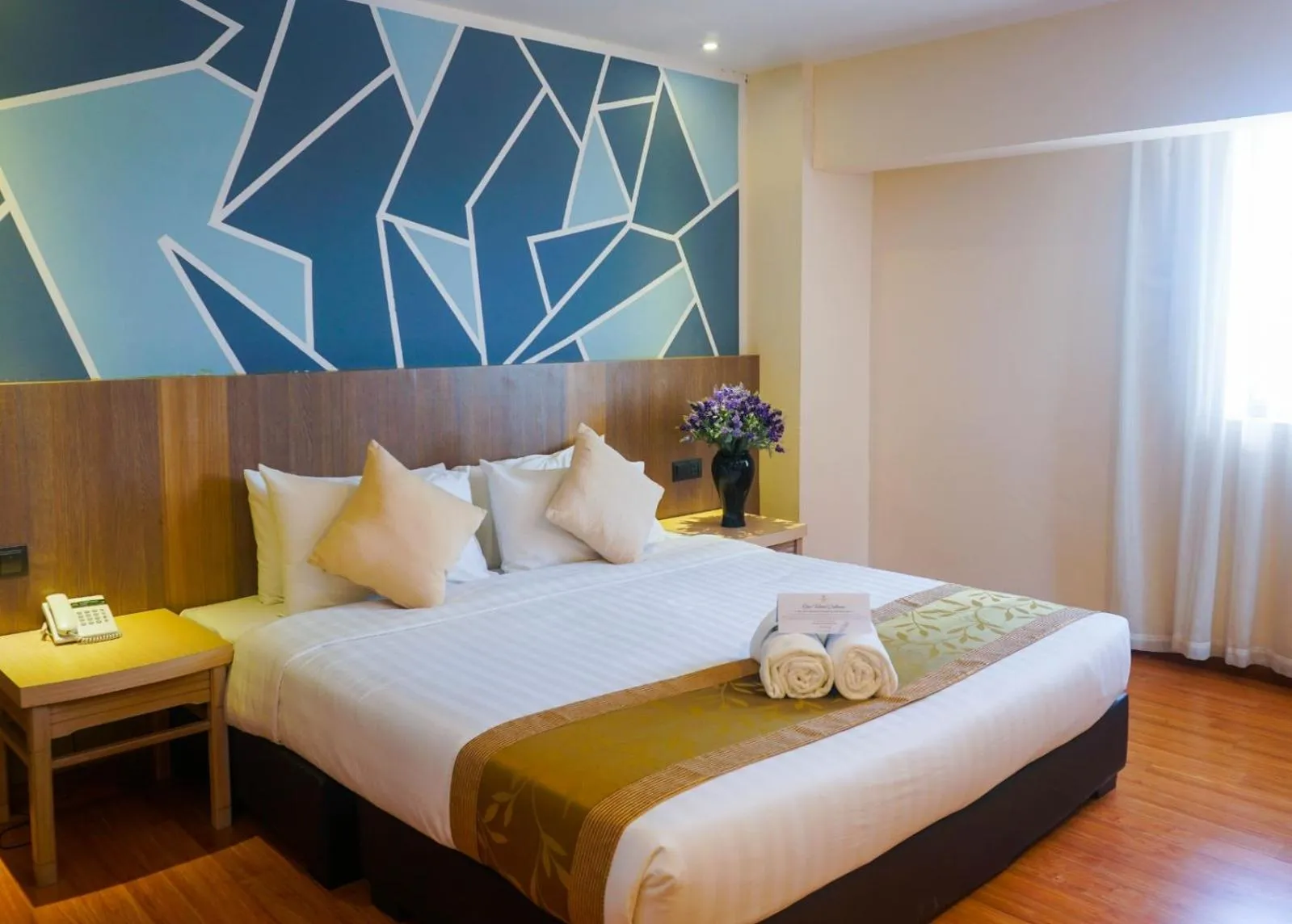 Bed in Kemena Plaza Hotel