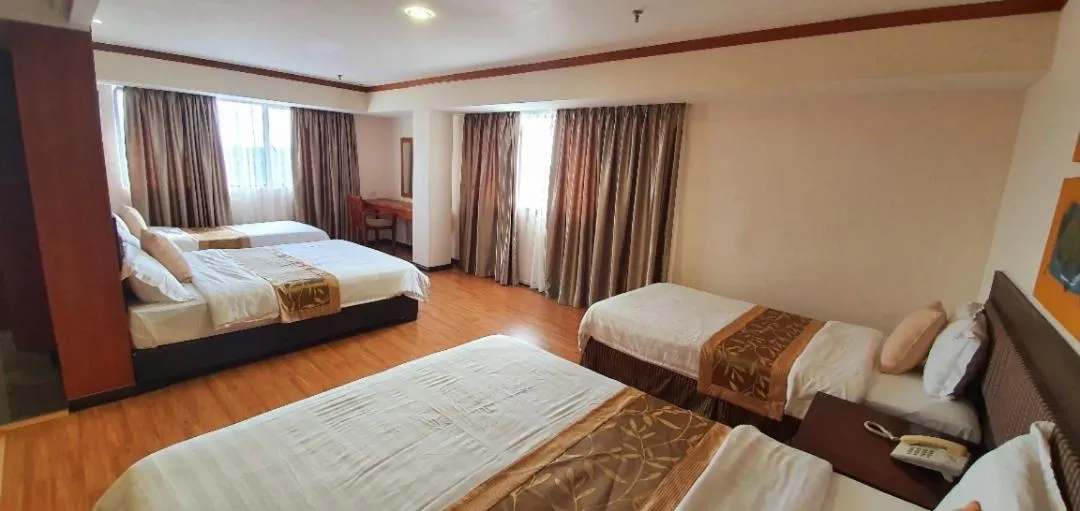 Bed in Kemena Plaza Hotel