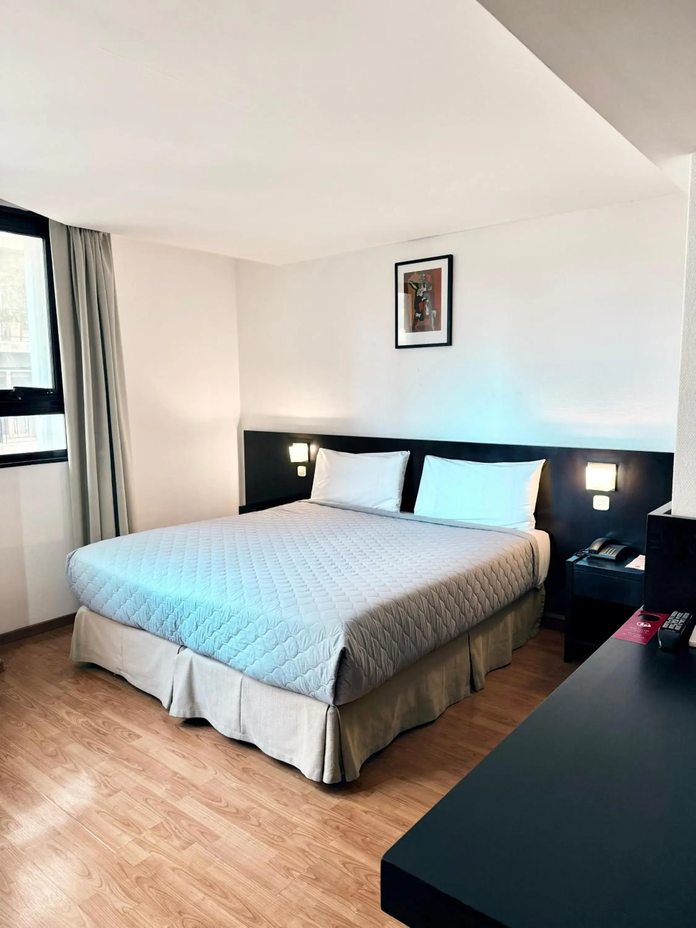 Bed in Urquiza Apart Hotel & Suites Bed in Urquiza Apart Hotel & Suites