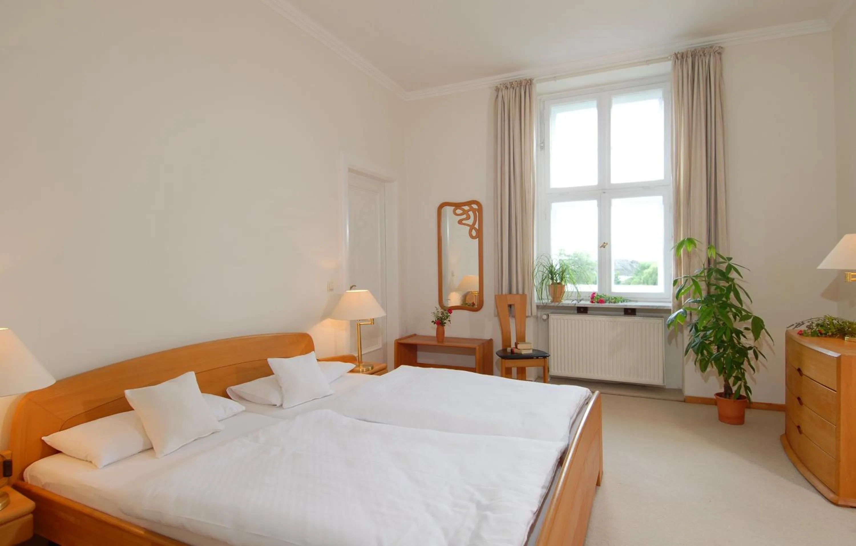 Photo of the whole room, Bed in Bio- und Gesundheitshotel Gutshaus Stellshagen