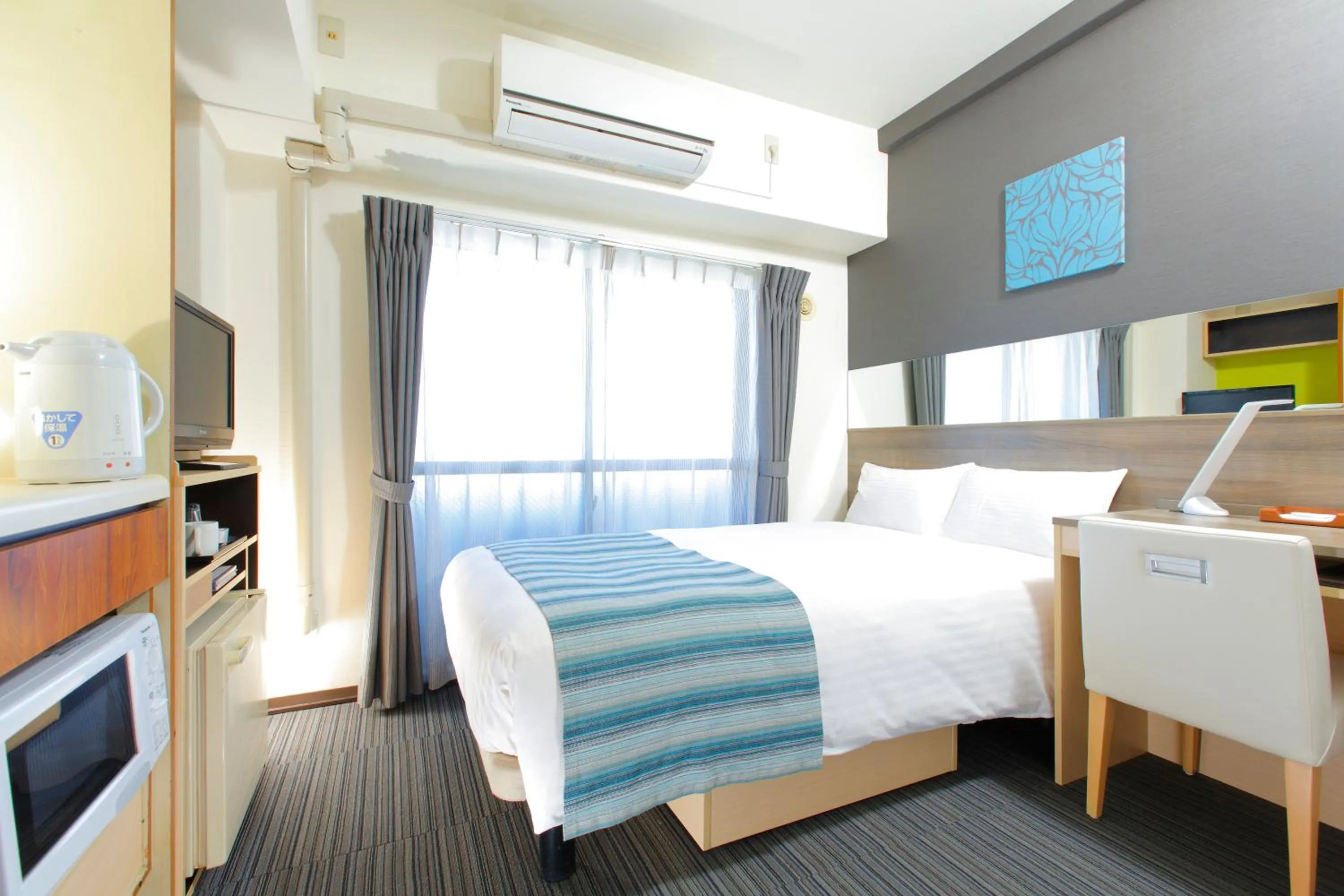 Photo of the whole room, Bed in HOTEL MYSTAYS Ueno Inaricho