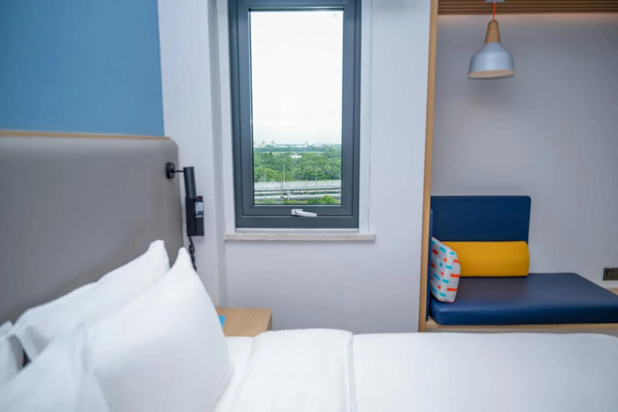 Photo of the whole room, Bed in Holiday Inn Express Shanghai Pudong Airport by IHG