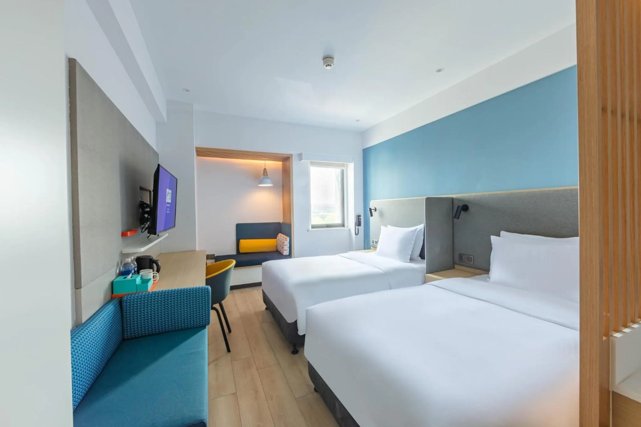 Photo of the whole room, Bed in Holiday Inn Express Shanghai Pudong Airport by IHG