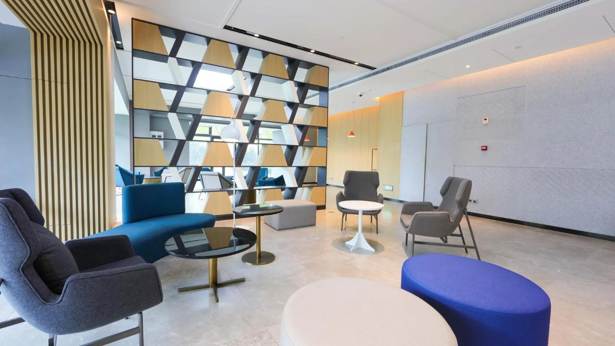 Lobby or reception in Holiday Inn Express Shanghai Pudong Airport by IHG