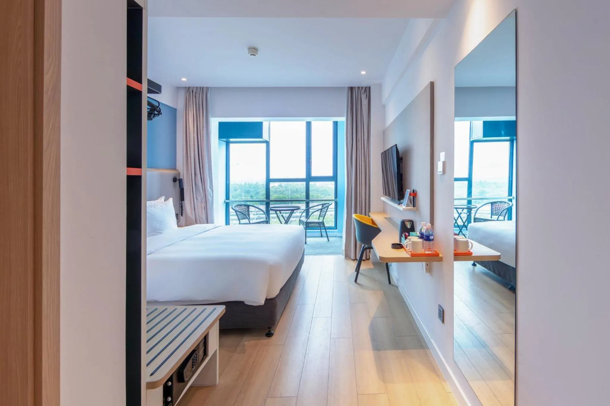 Photo of the whole room, Bed in Holiday Inn Express Shanghai Pudong Airport by IHG