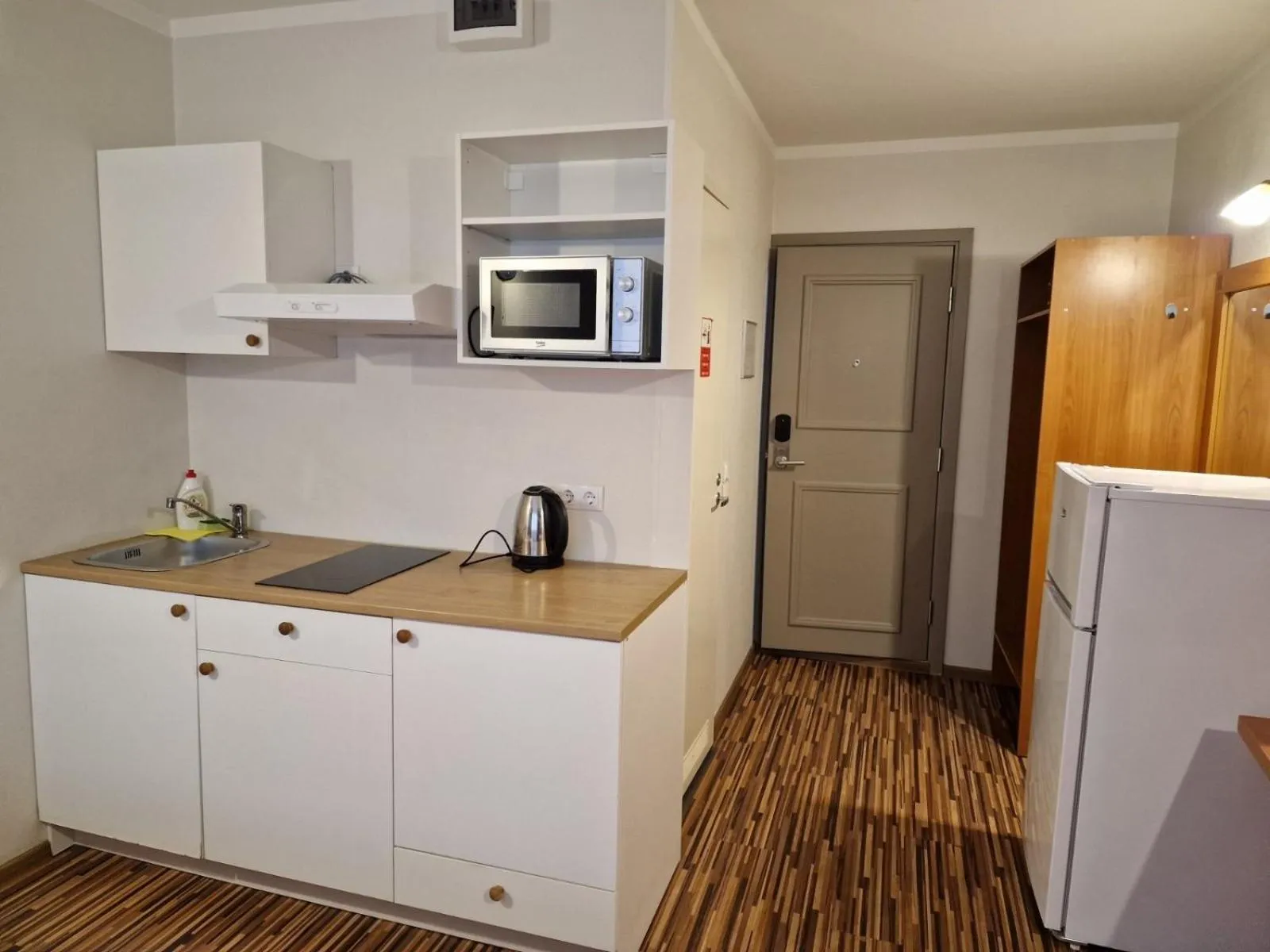 Kitchen or kitchenette in Ecoland Hotel