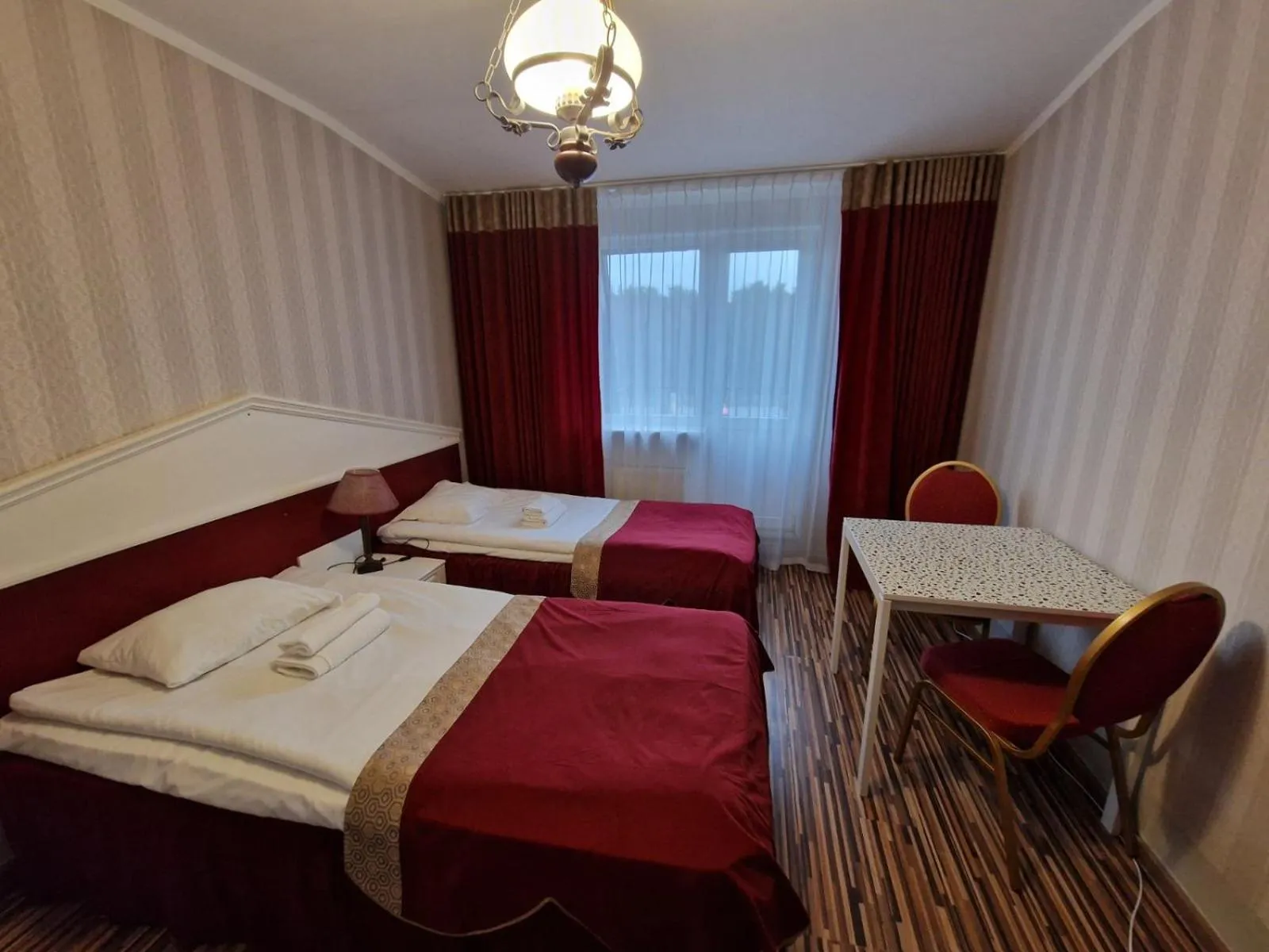 Bed in Ecoland Hotel