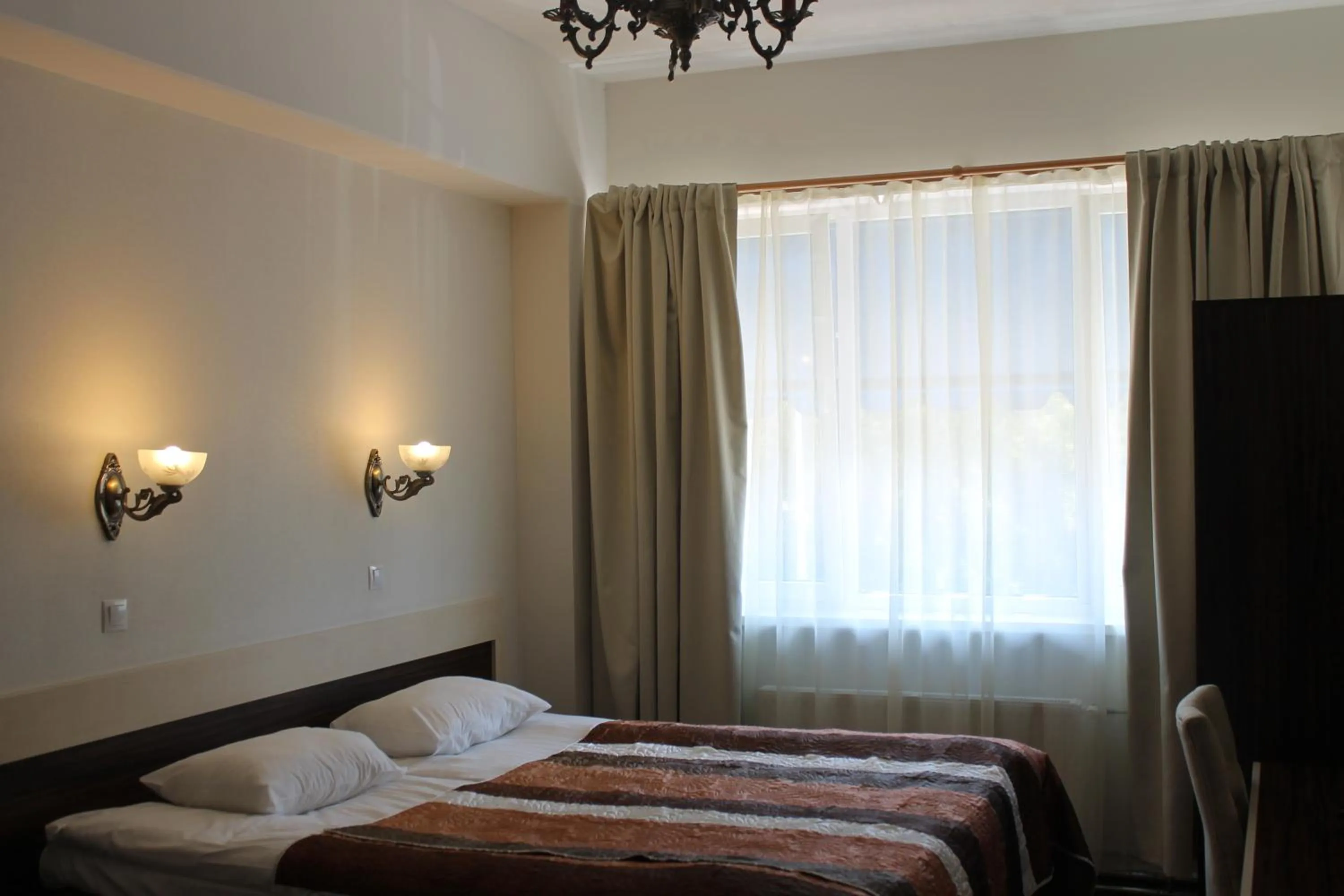 Bed in Ecoland Hotel