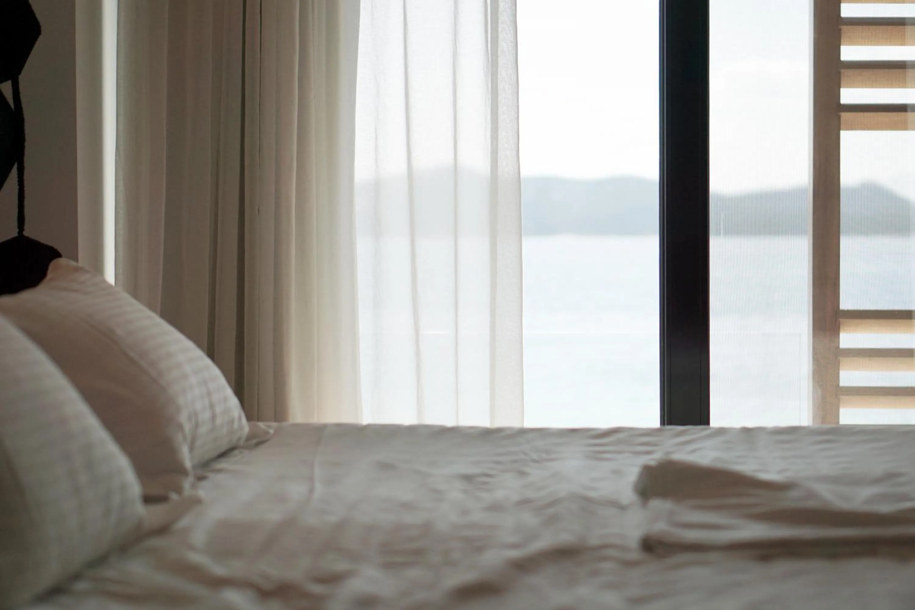 Bed in Sunday Boutique Hotel