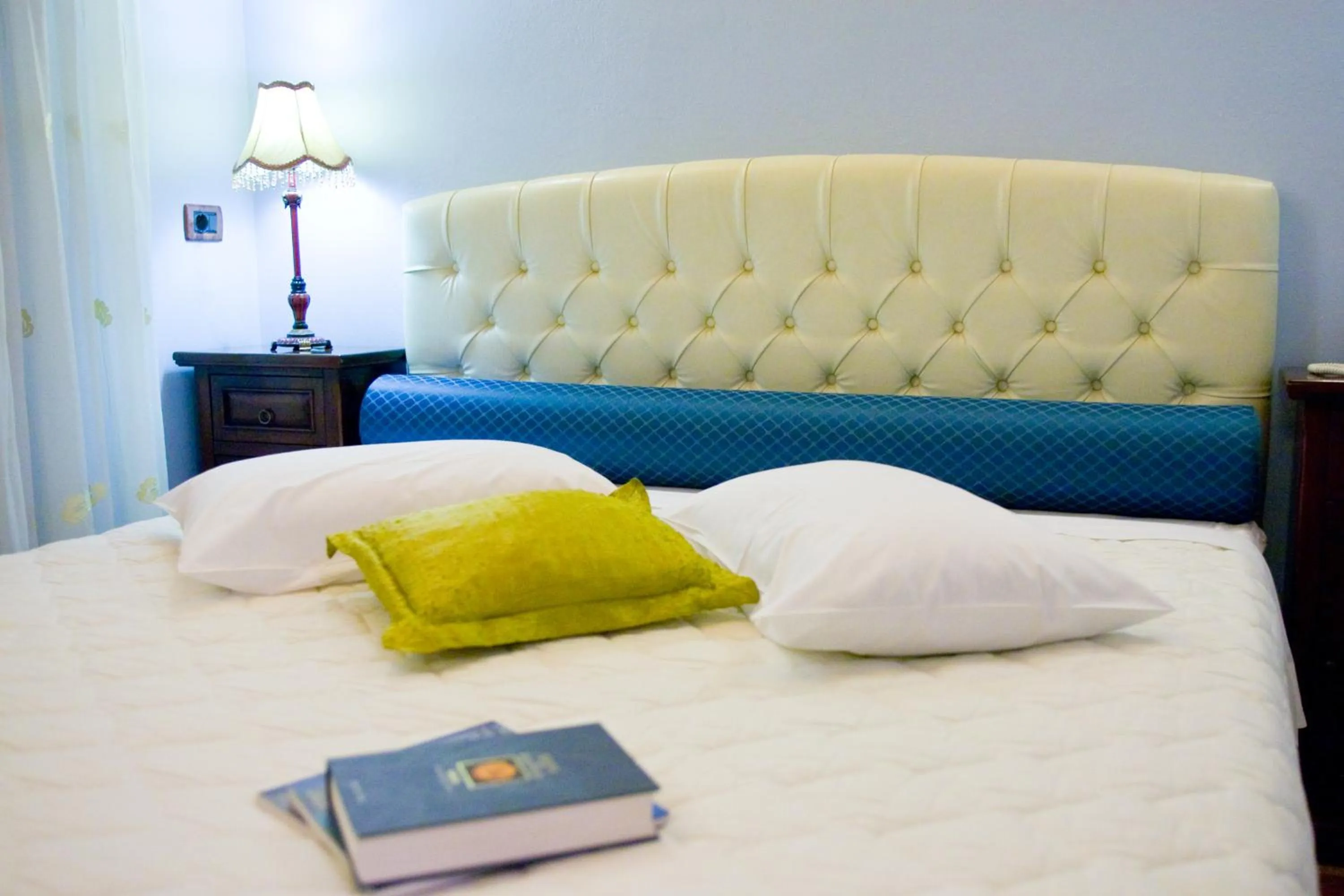 Bed in Kyveli Suites