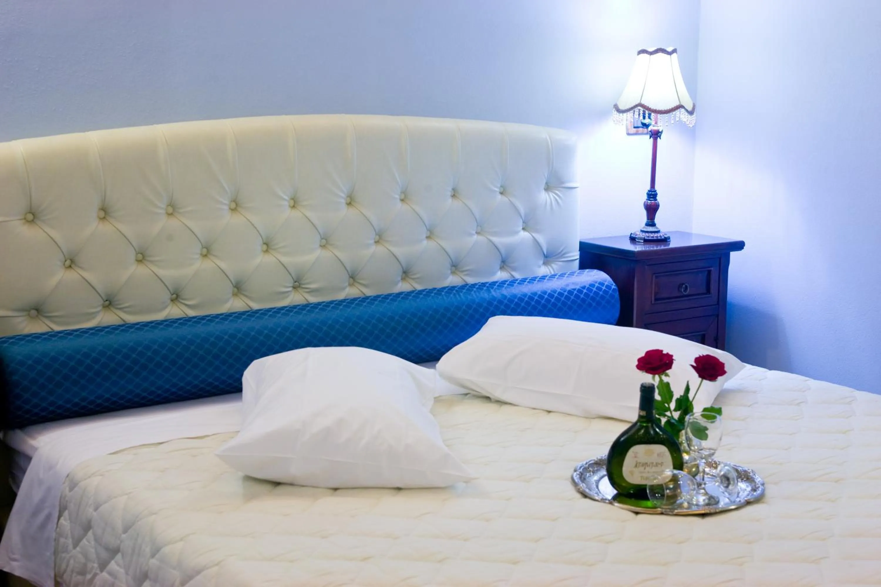 Bed in Kyveli Suites