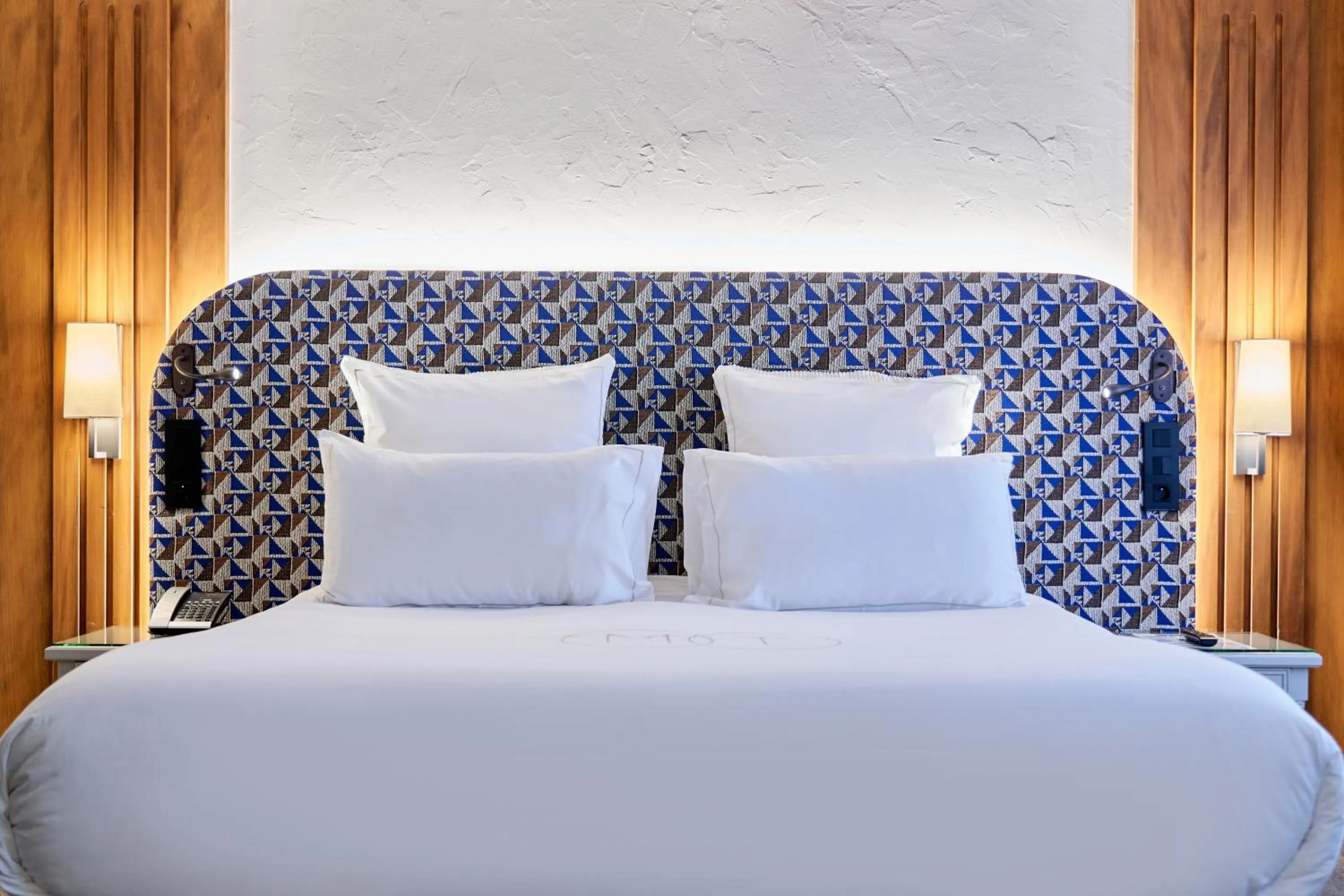 Bed in Relais & Châteaux La Maison Des Têtes