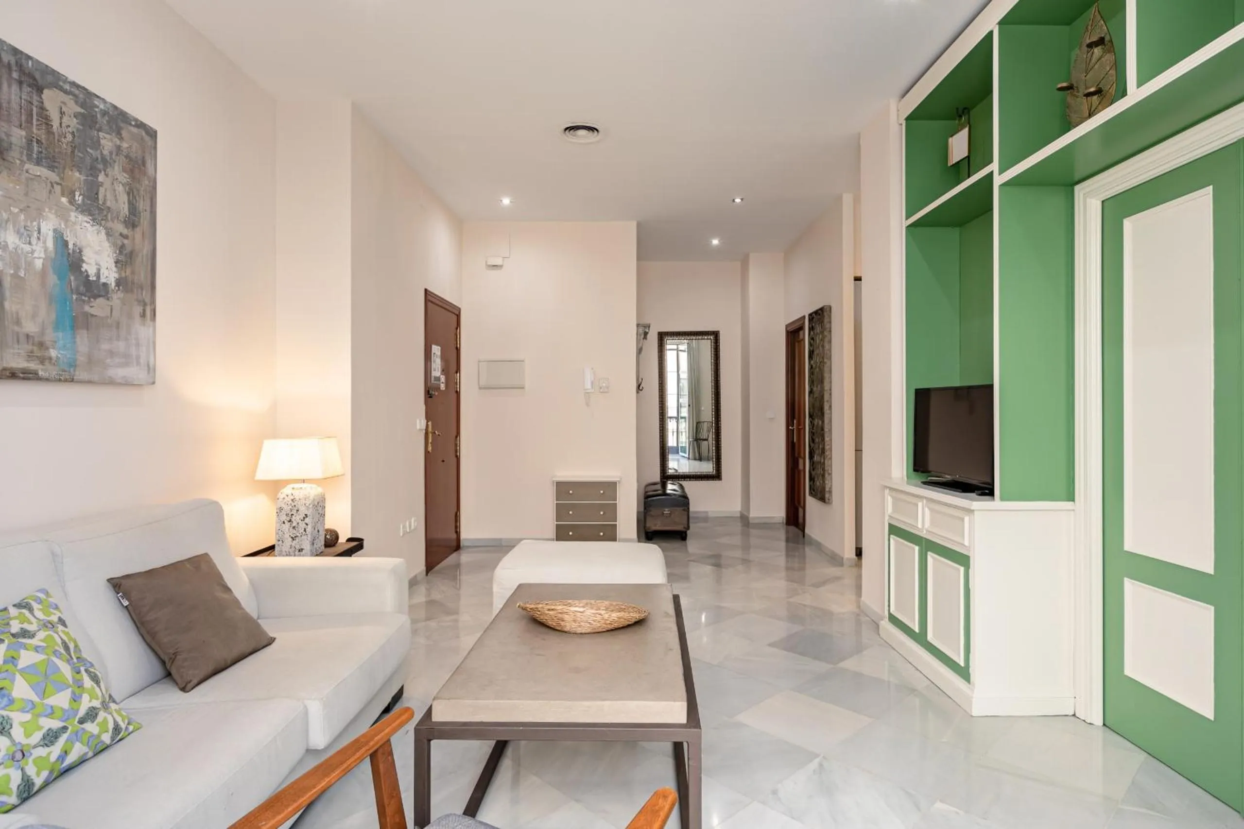 Communal lounge/ TV room in Green-Apartments Sierpes