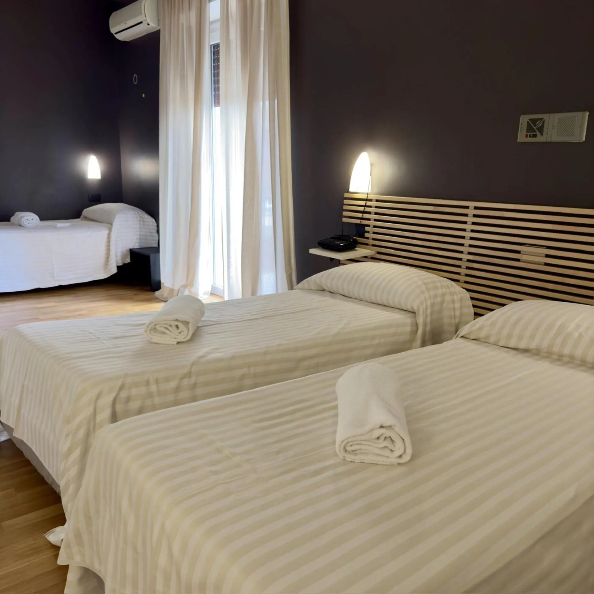 Bed in Hotel Quadrifoglio