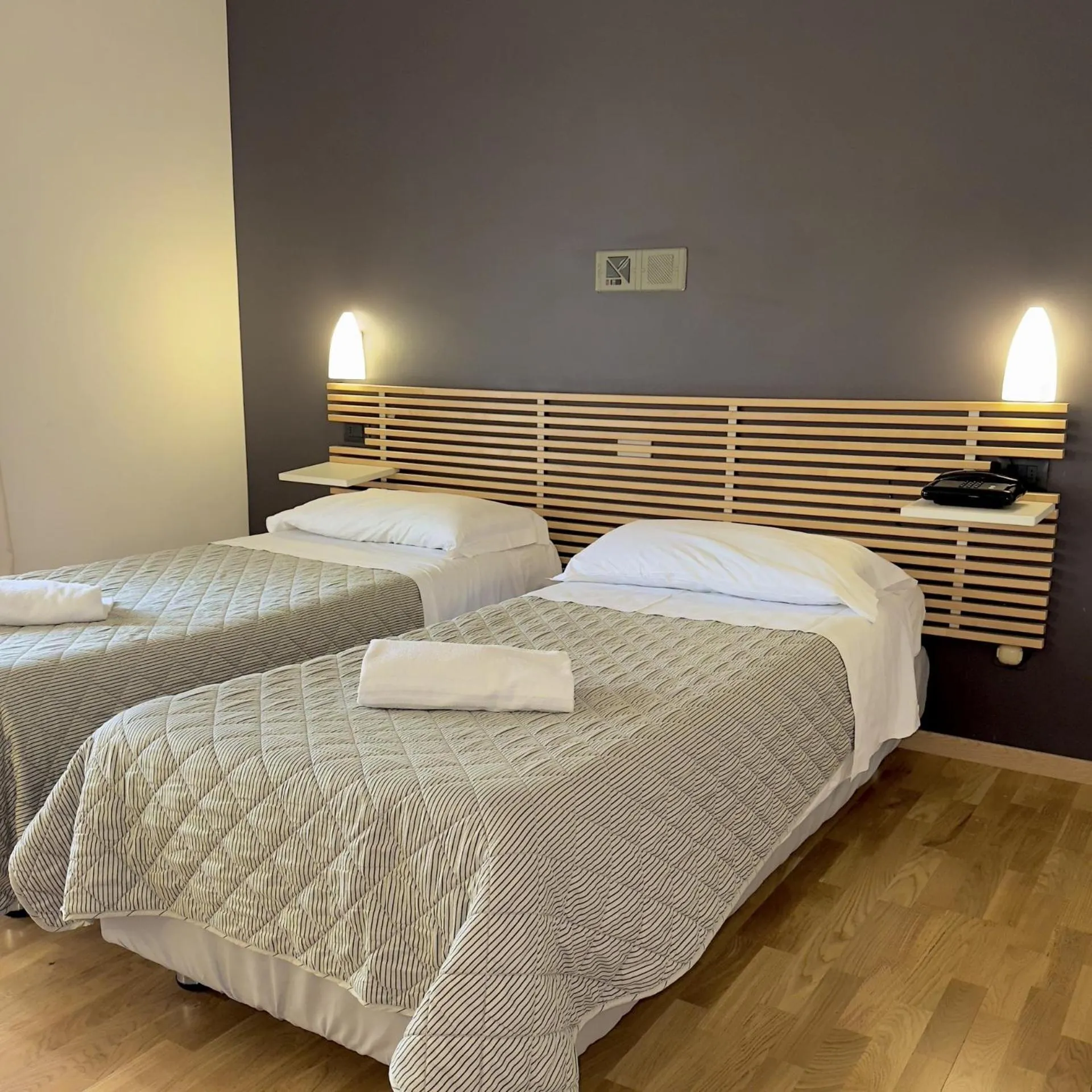 Bed in Hotel Quadrifoglio