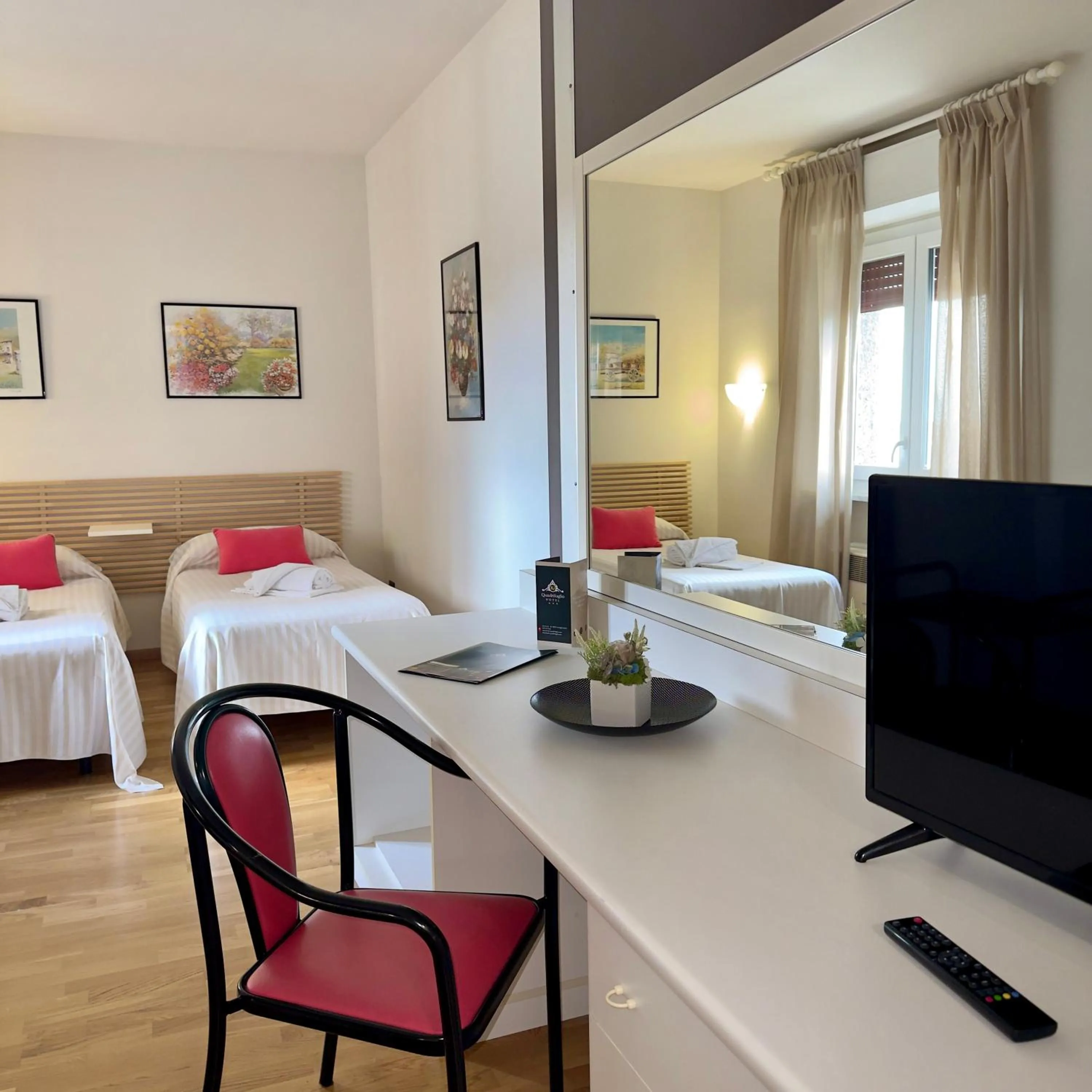 Bed in Hotel Quadrifoglio