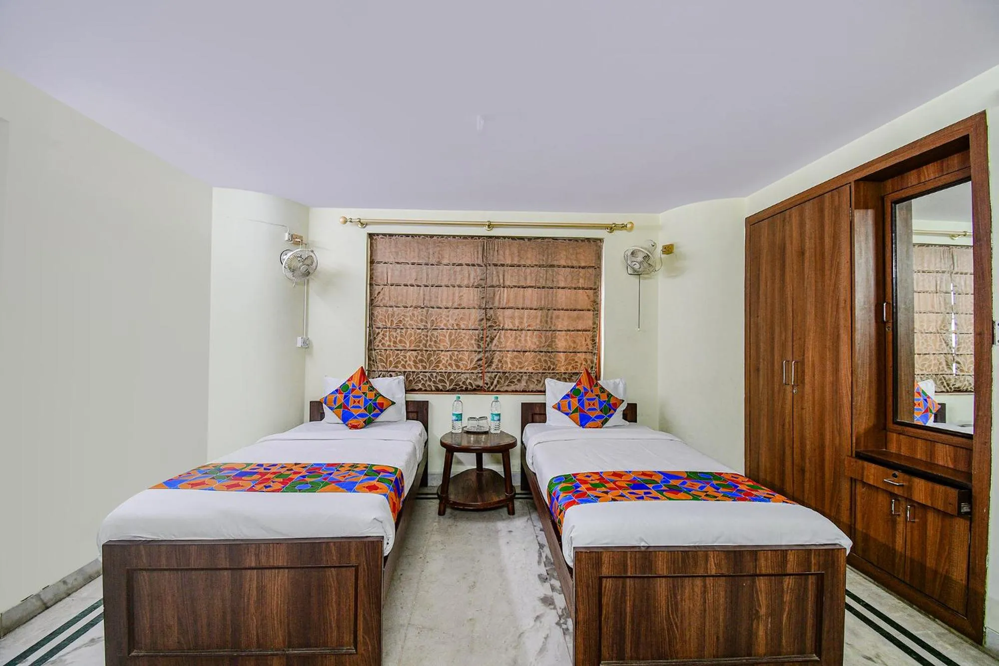 Bed in FabExpress Ullash Residency