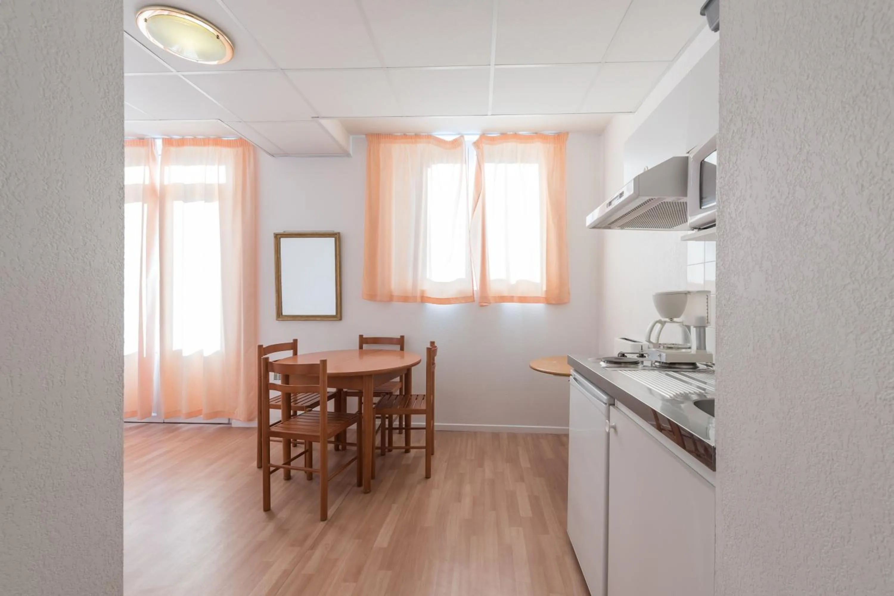 Kitchen or kitchenette in City Résidence Termalia