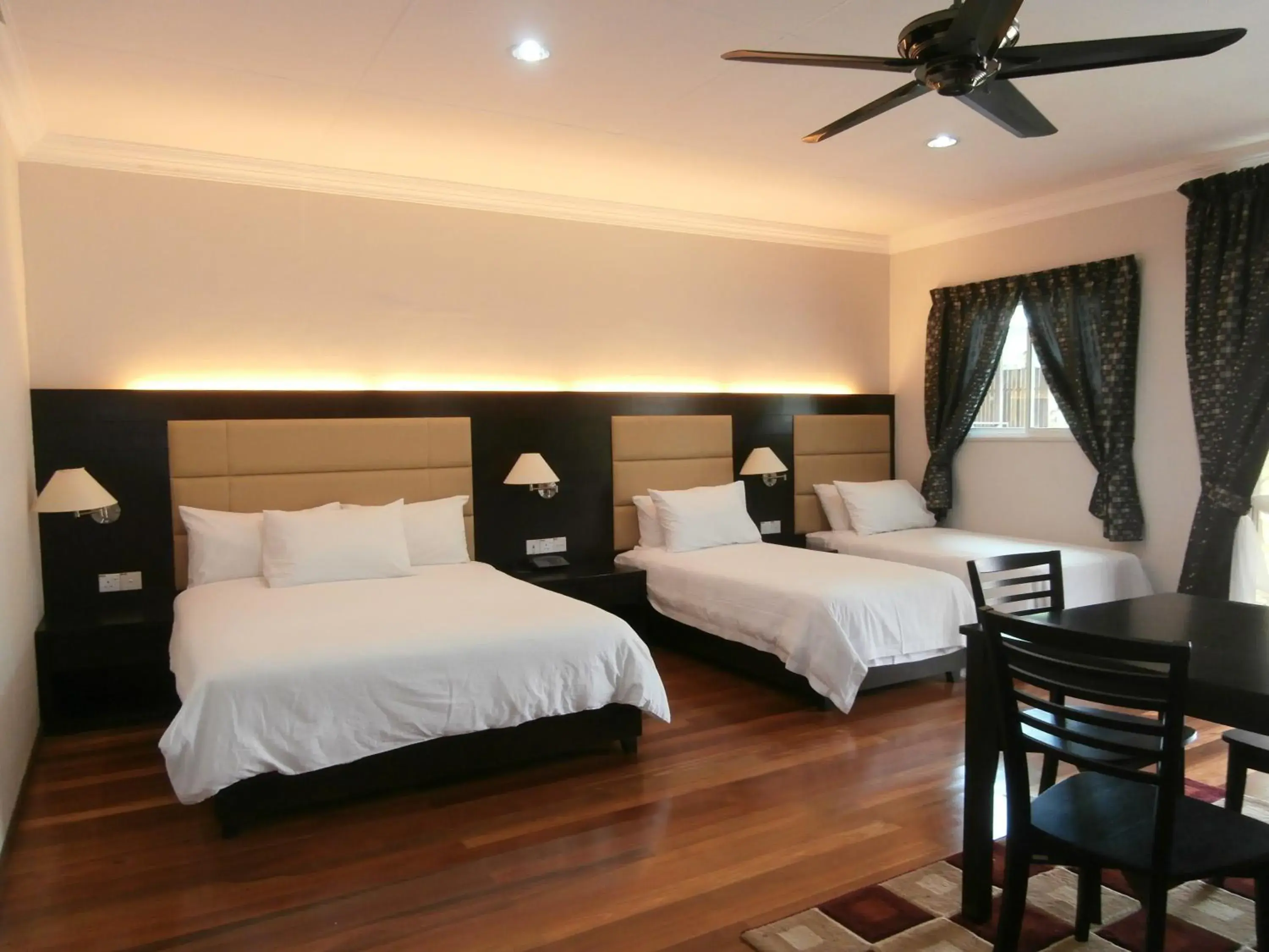 Photo of the whole room, Bed in Langkah Syabas Beach Resort